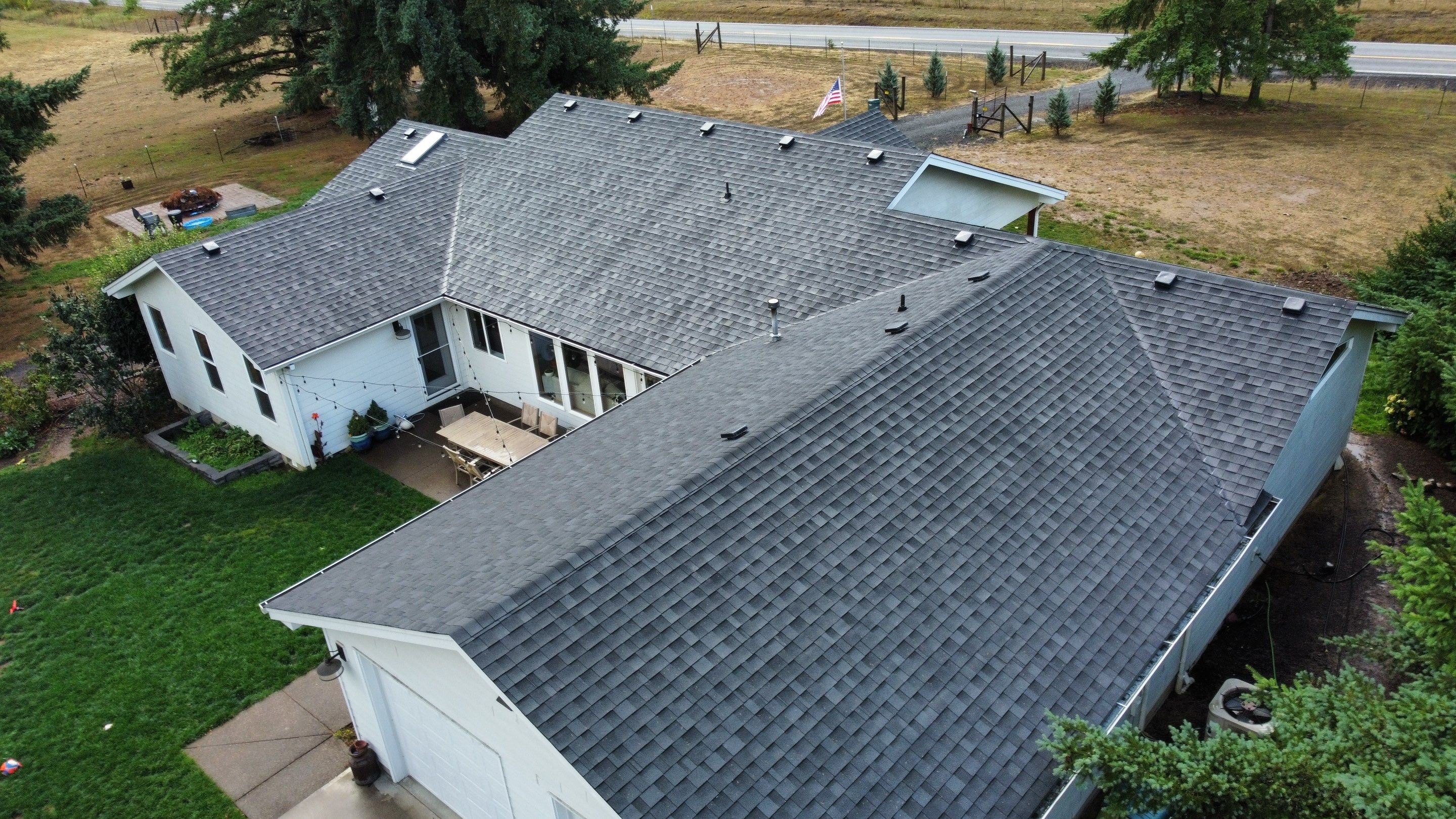 Residential Roofing Installation using IKO Dynasty (Color: Granite Black) by Orezona Building & Roofing Company, Inc.