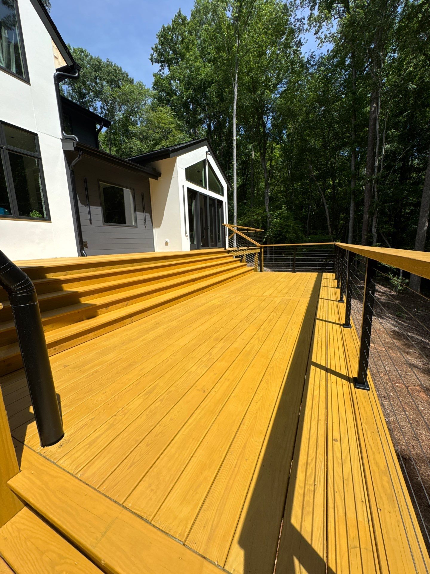 Porch and Deck staining  by GonzalezPainters & Contractors Inc 
