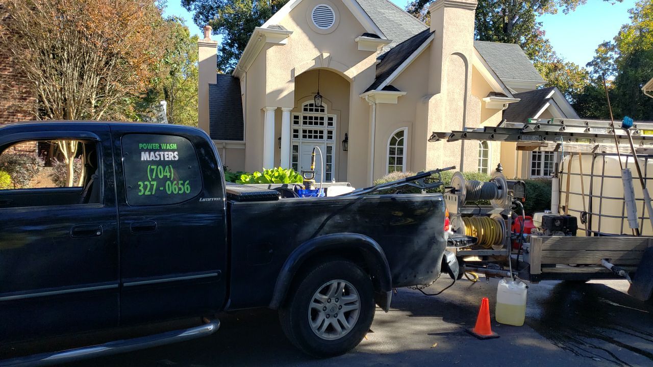 Driveway Clean using cleaner by Power Wash Masters LLC