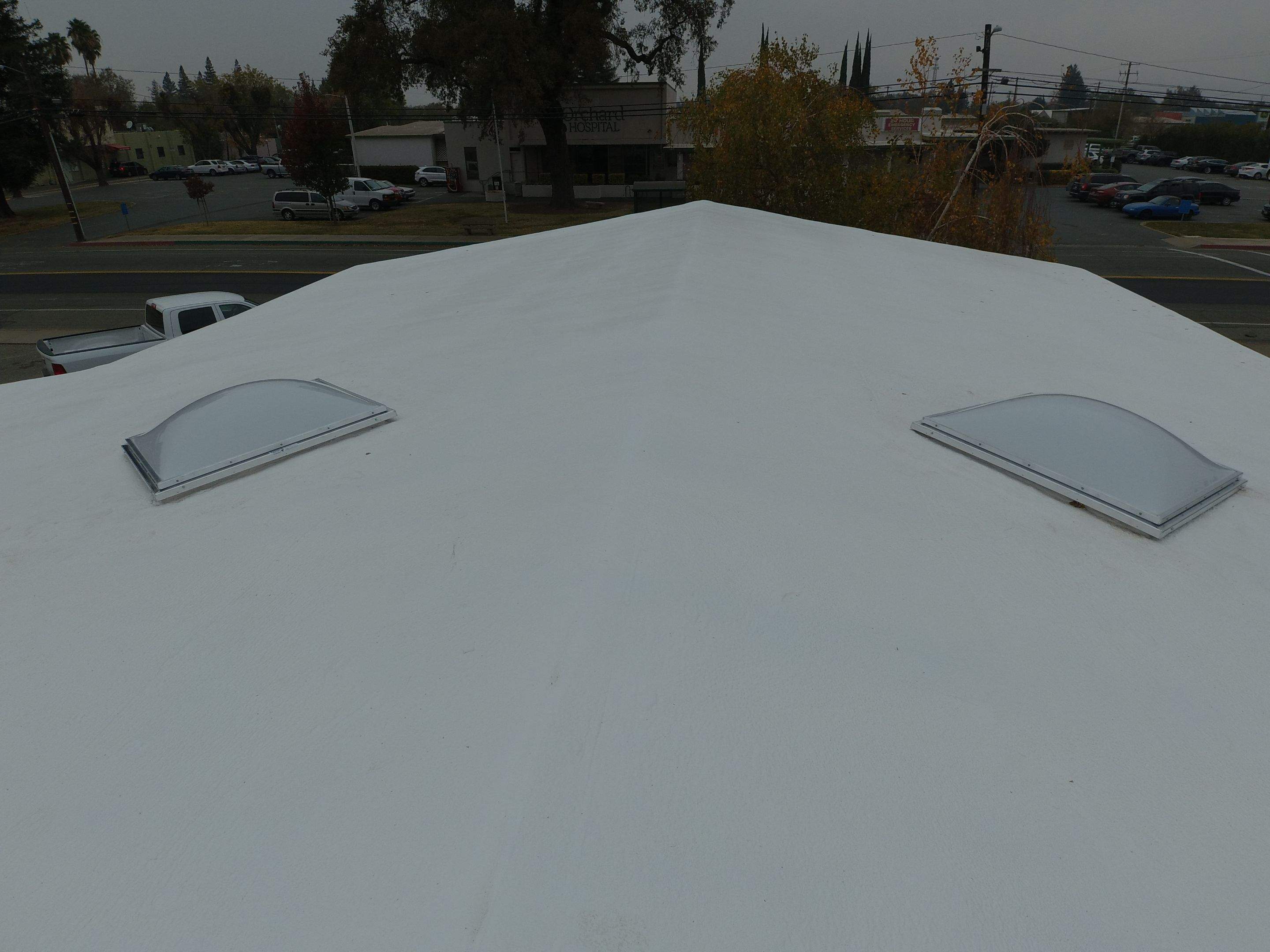 Spray foam and coatings using Conklin Benchmark/PUMA XL coatings and spray foam by Straight Edge Roofing Inc