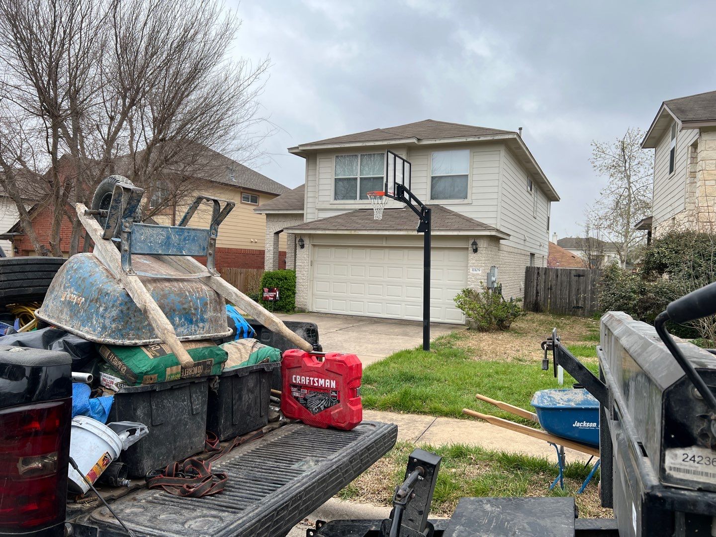 Wind damaged roof replacement by Oakwood Roofing and Construction, LLC