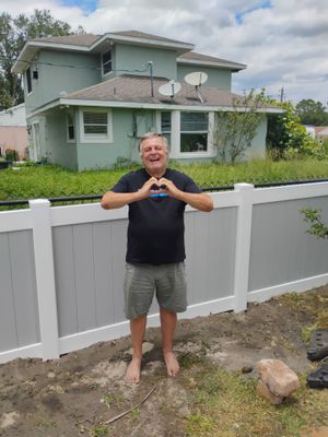 White and Gray Vinyl Privacy Fence Installation in North Port