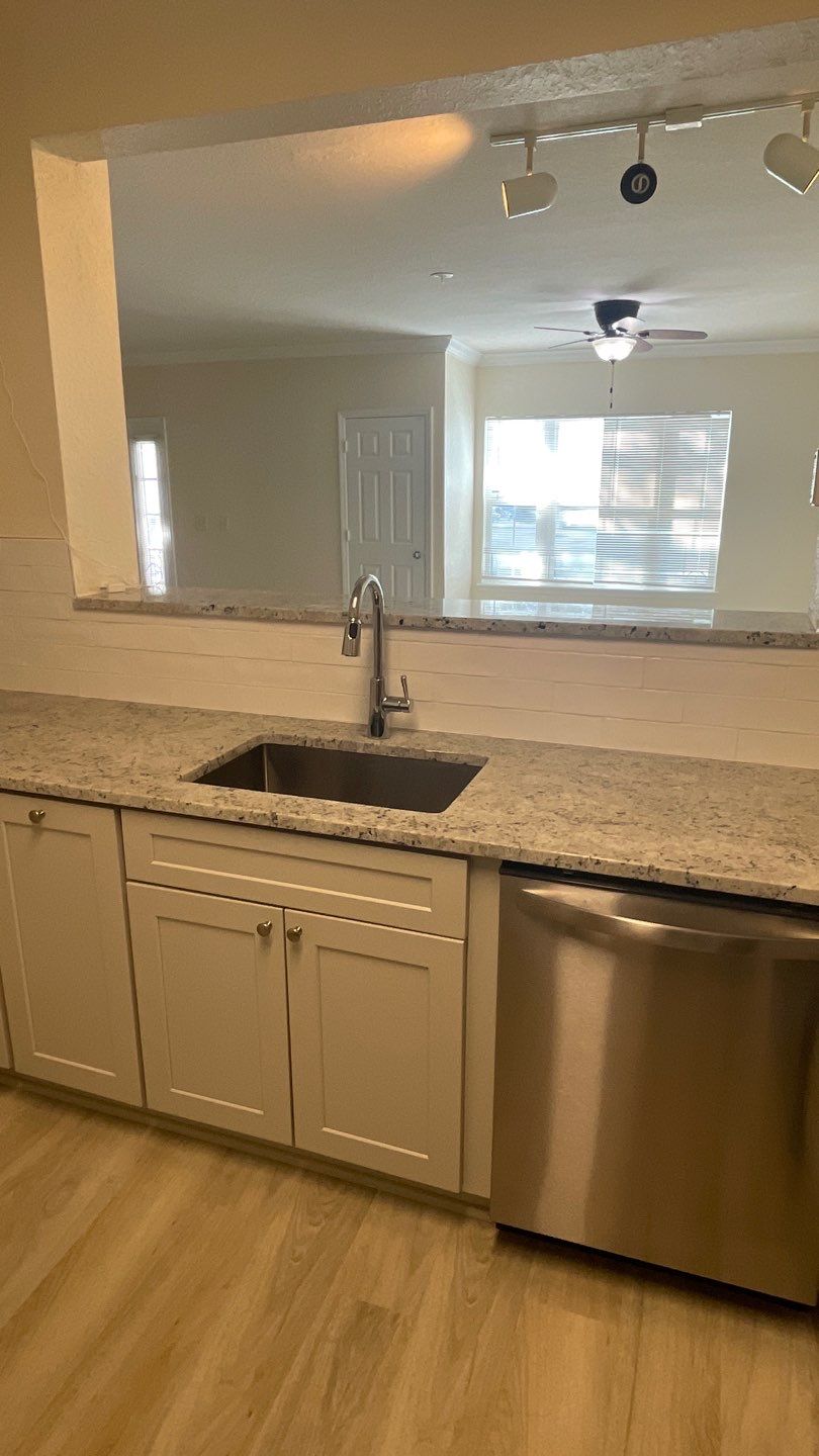 Home Remodel using LVP Flooring and Cabinets by HandyMangum