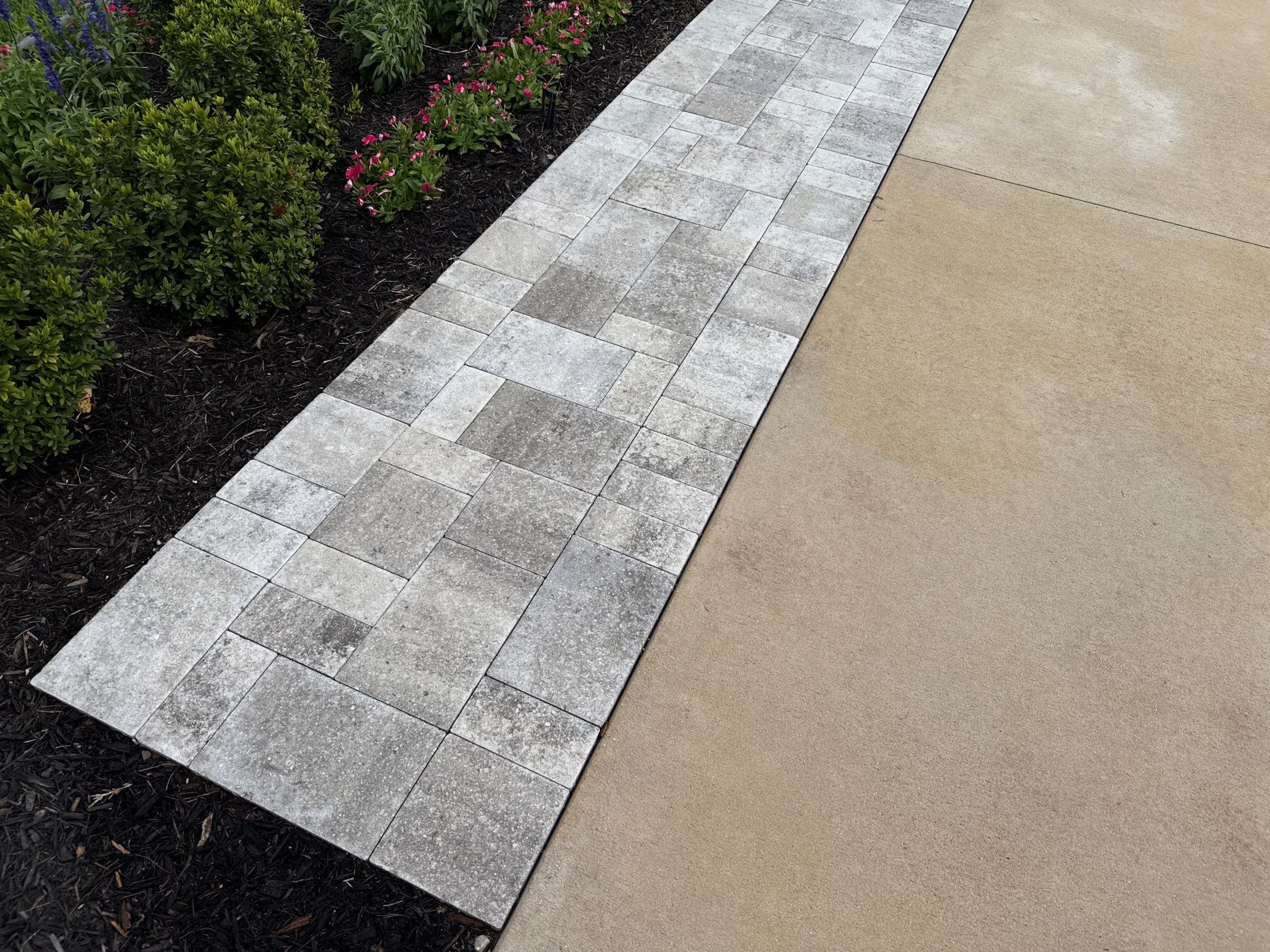 Rust Stain Removal from Concrete Driveway and Pavers in Park East at Azario | Lakewood Ranch, FL by Sunshine AquaWash