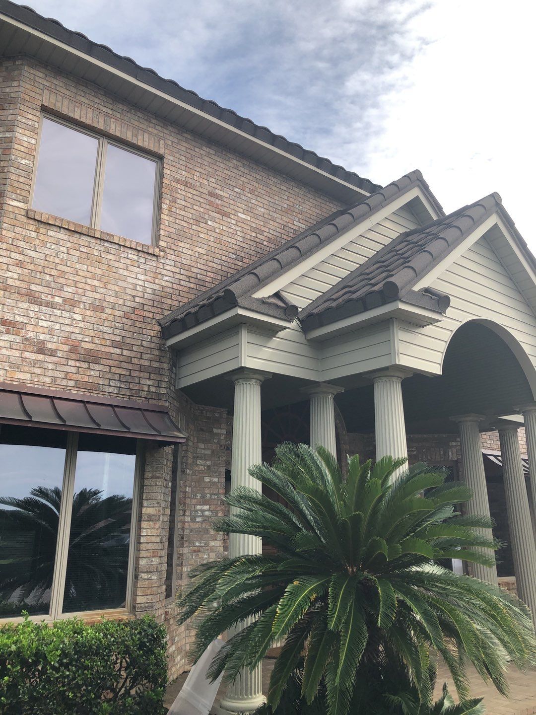 Seamless Gutter Installation with Wicker Color K-Style Gutters and LeafBlaster Pro Mesh Gutter Guards by Gutter Professors