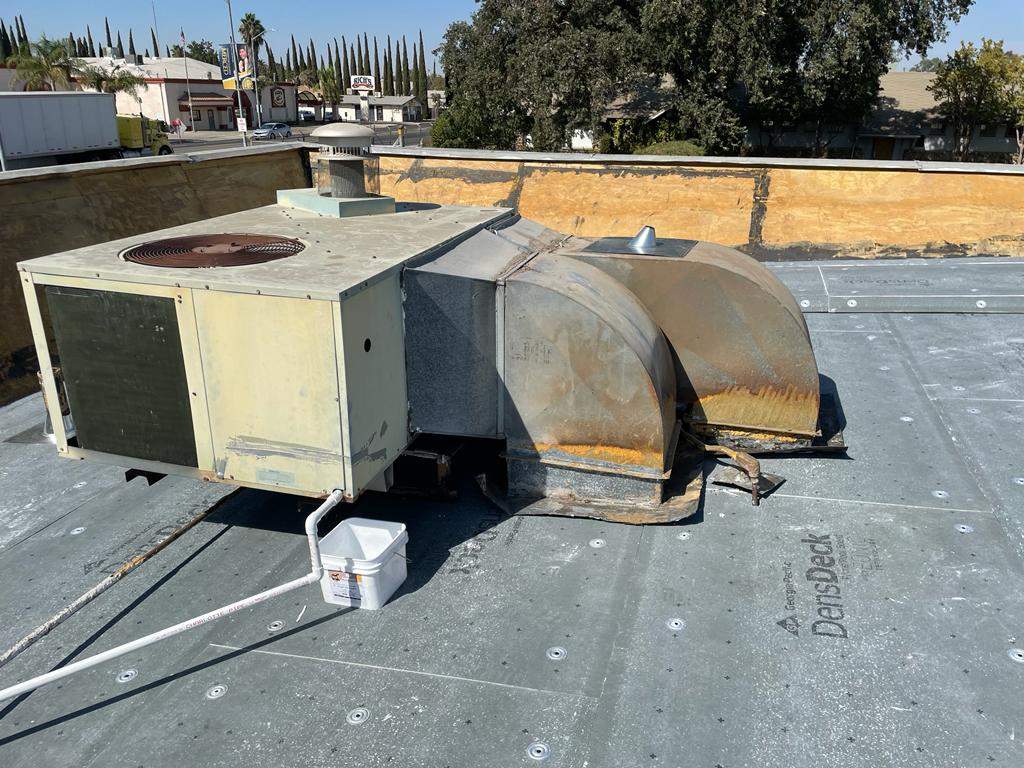 Commercial Roofing Installation using General Coatings acrylic coatings and spray foam by Straight Edge Roofing Inc