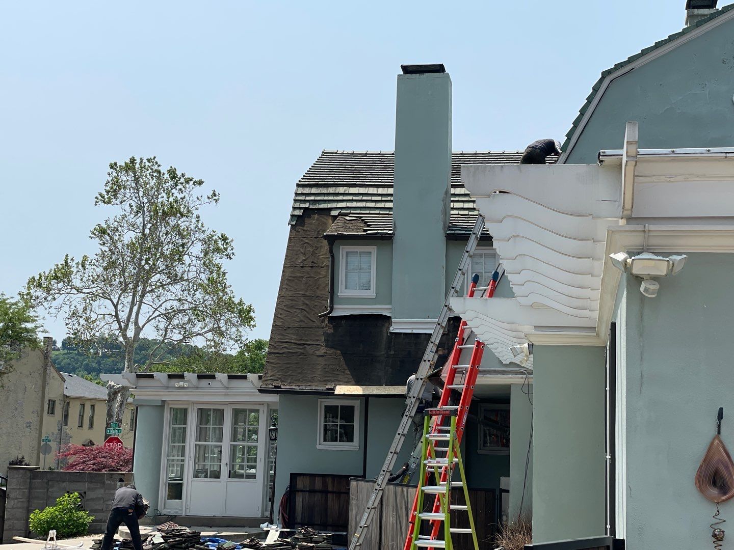 Slate removal/Cedar Shake replacement by Storm Contracting 