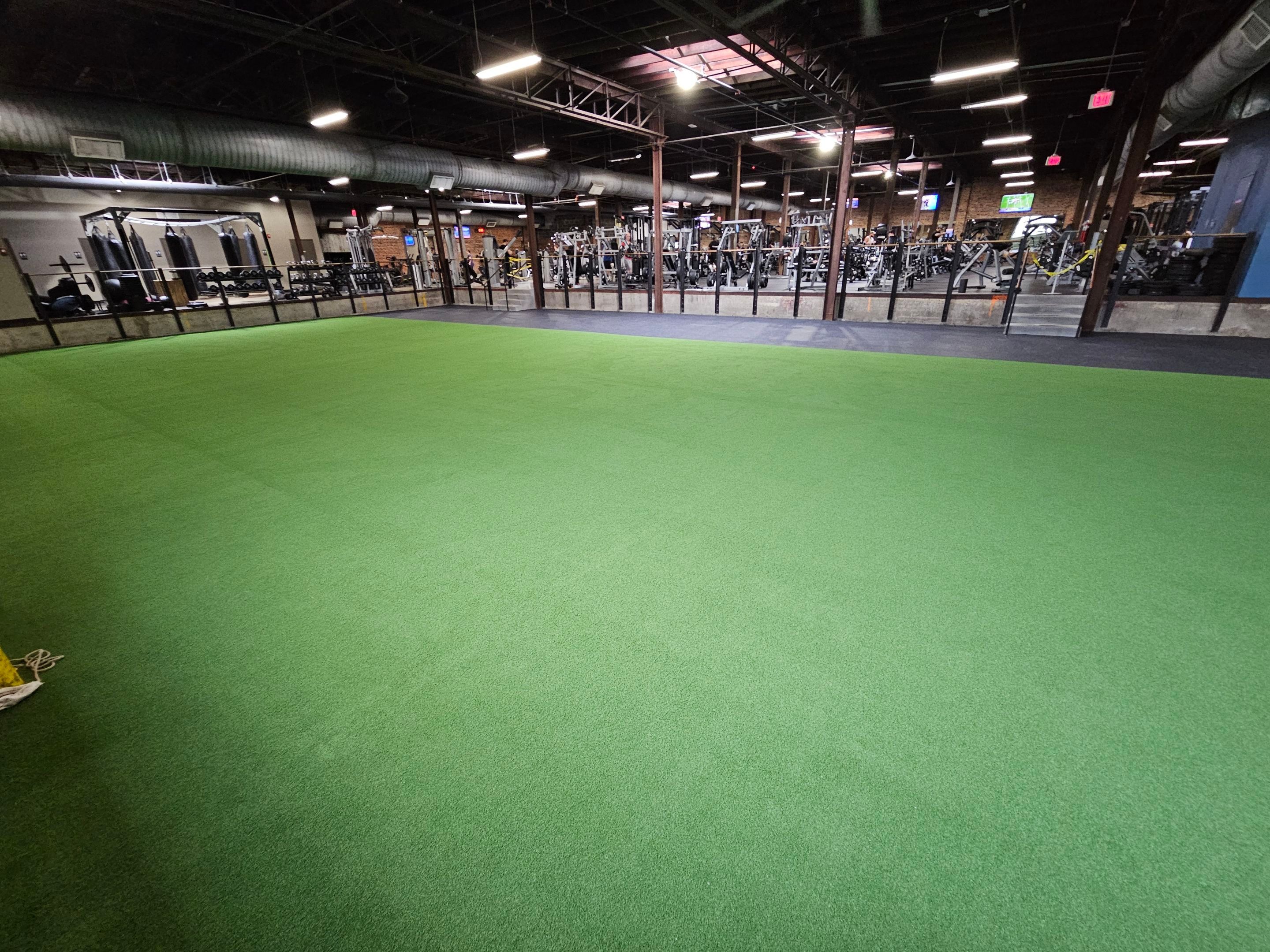 Norfolk OLF - Strength area turf, rubber installation and front desk by Nova HomeWorks 