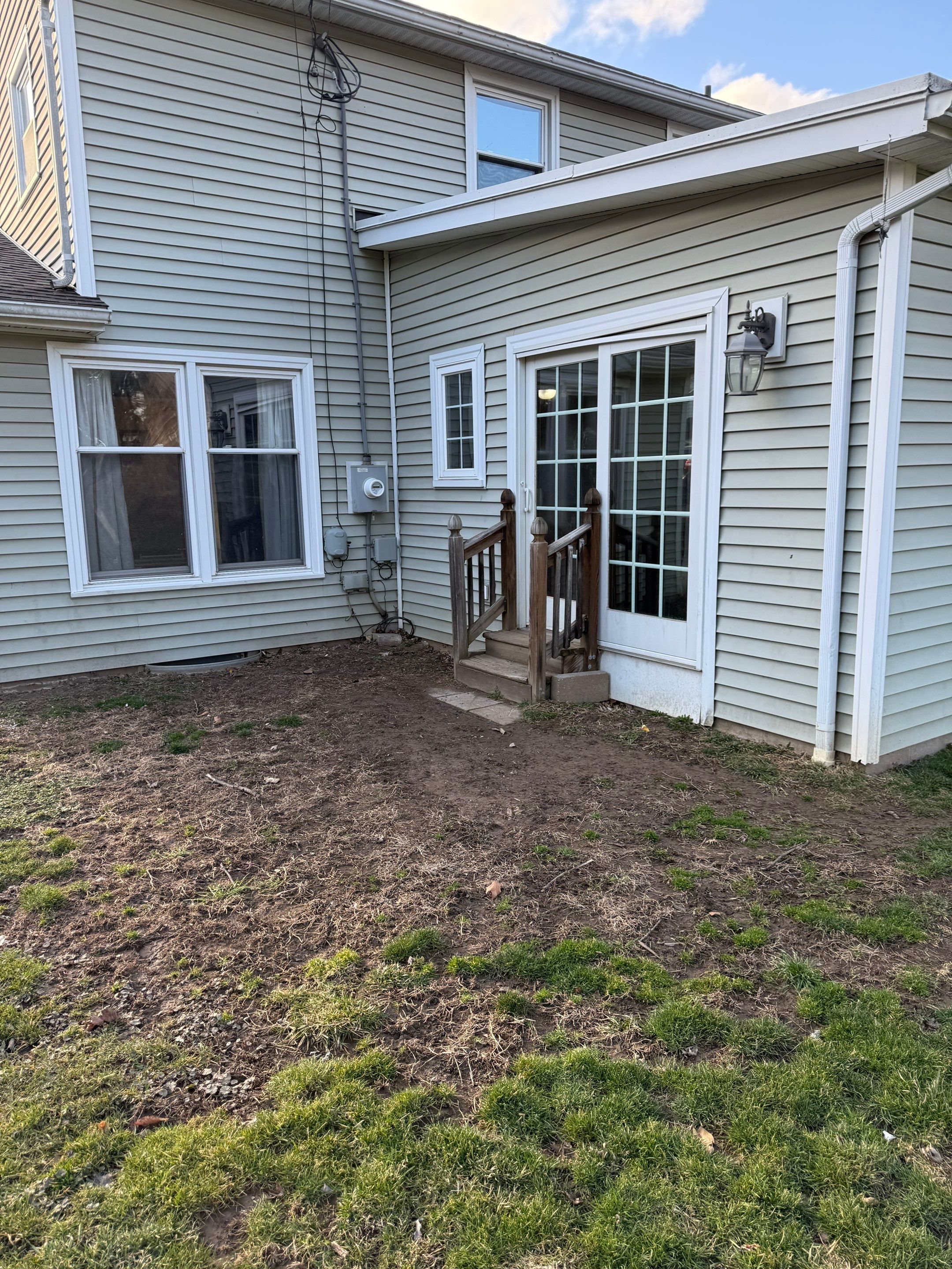 Oxford slate stamped patio  by NG Masonry & Construction LLC
