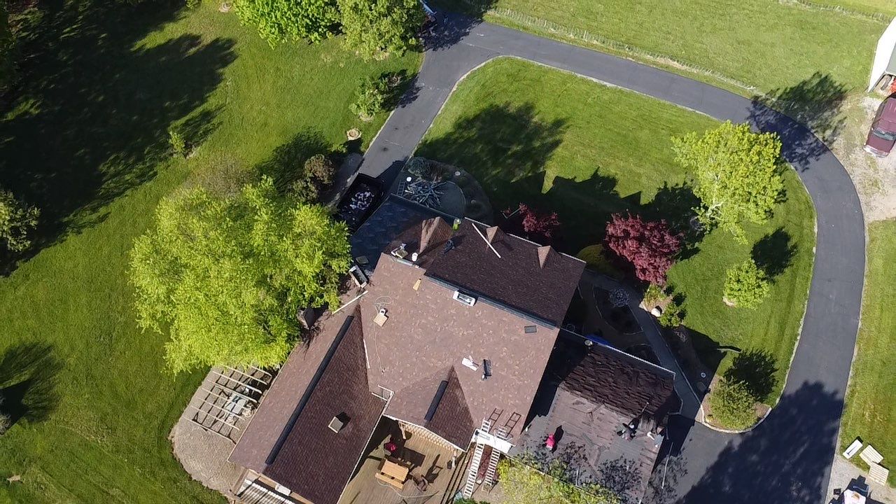 Residential Roofing Installation using Ownes Corning Brownwood Duration by Storm Contracting