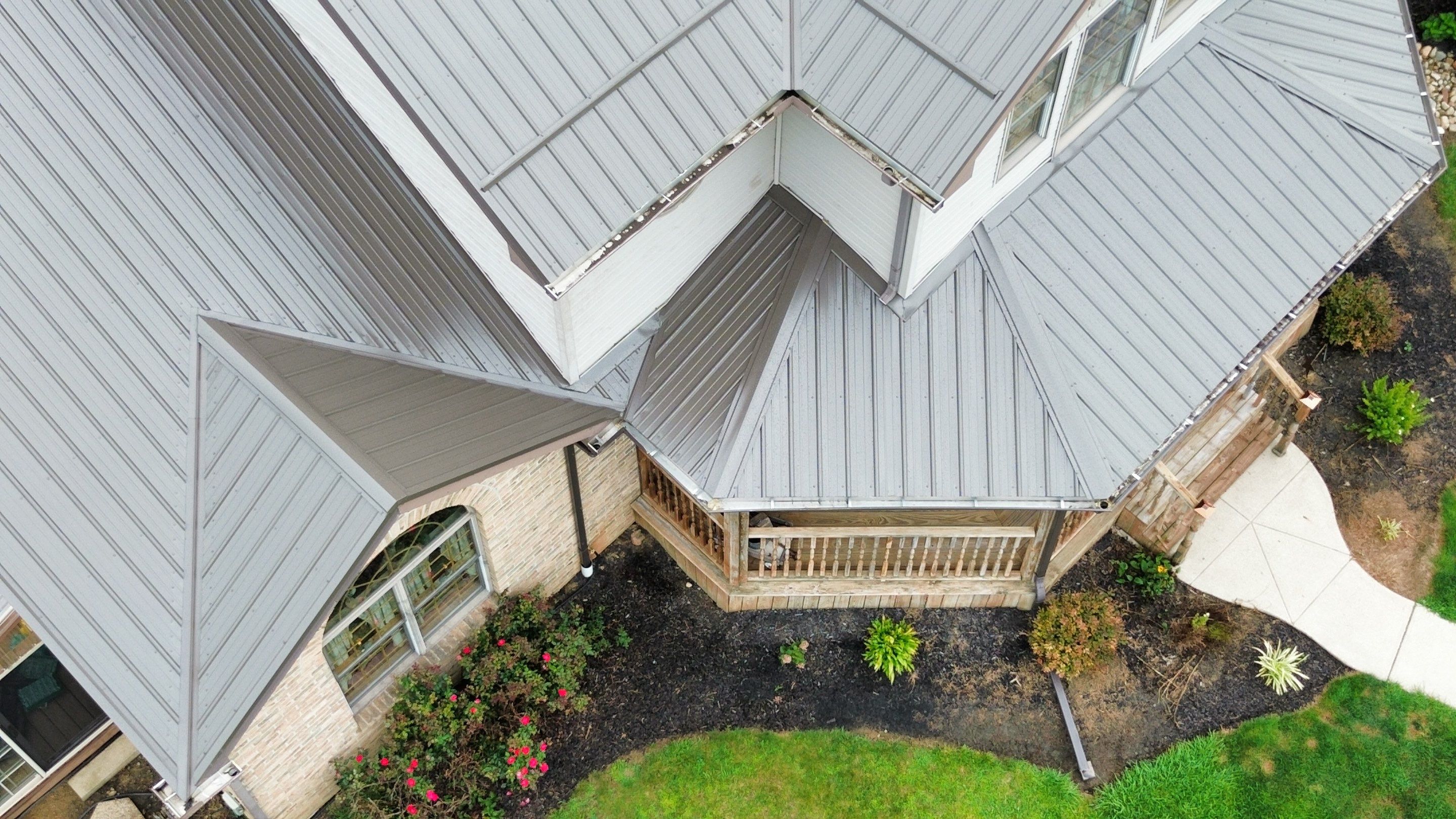 Residential Roofing Installation using Performance Panel Metal - Burnished Slate by RoofX 