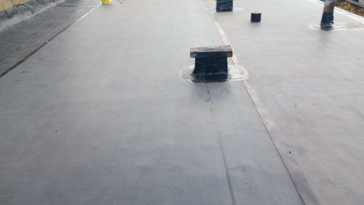 Commercial Roofing Installation using Performance Shingles by Mr. Roofer