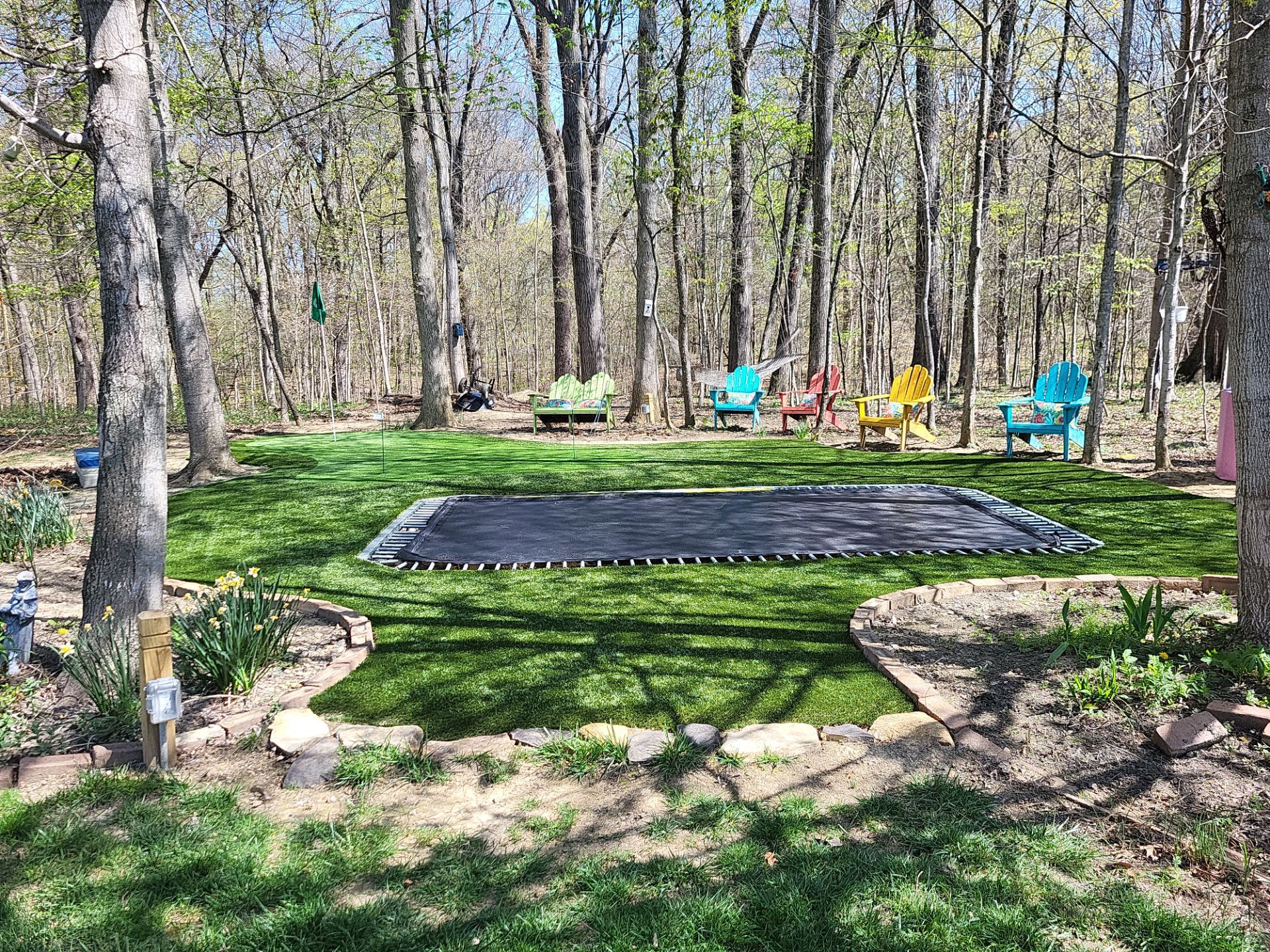 Green and Lawn around trampoline Galena, OH by Southwest Greens Midwest