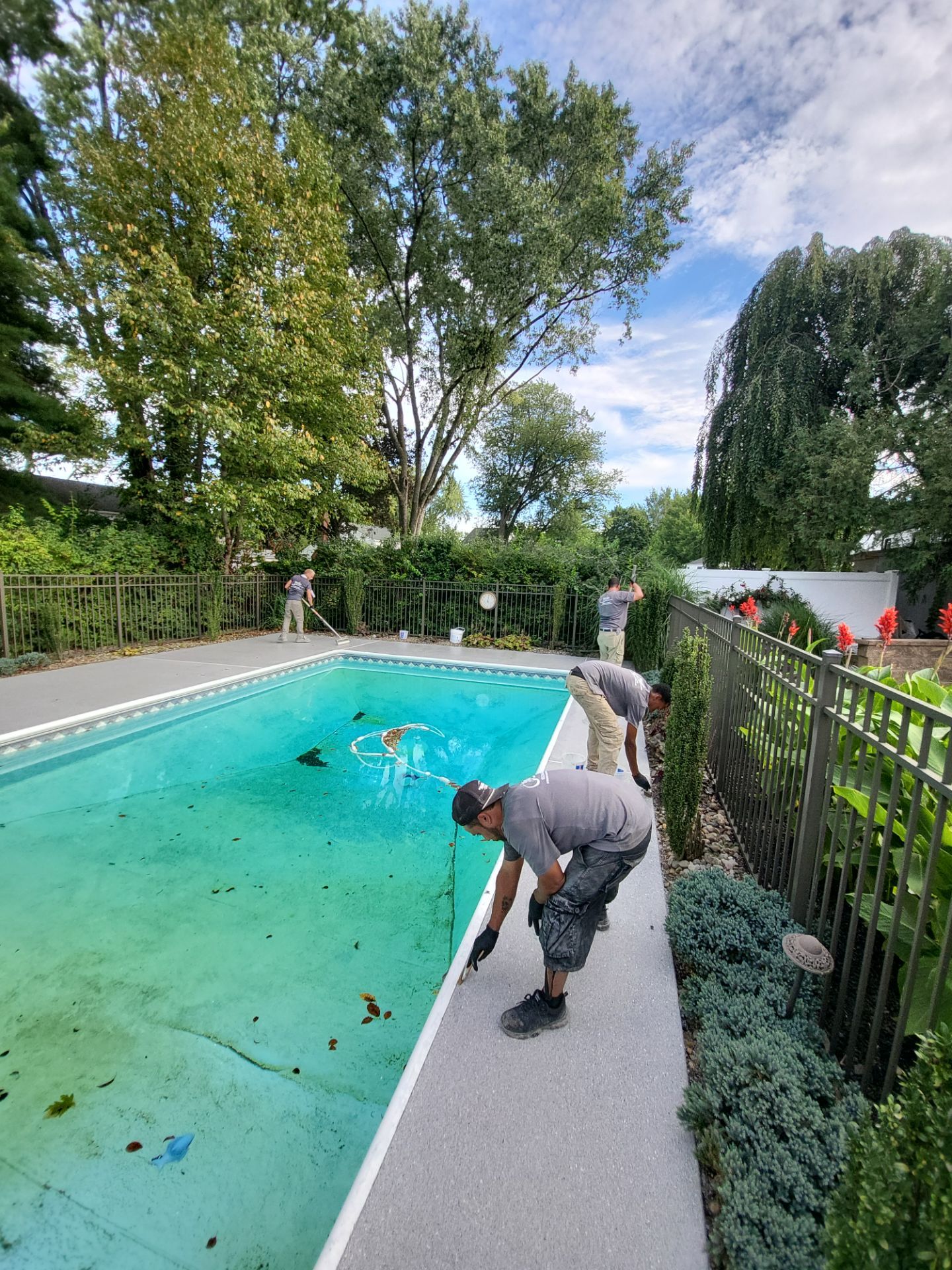 Blue Granite Pool Patio Concrete Coating in Lincoln Park by Spectrum Painting, LLC