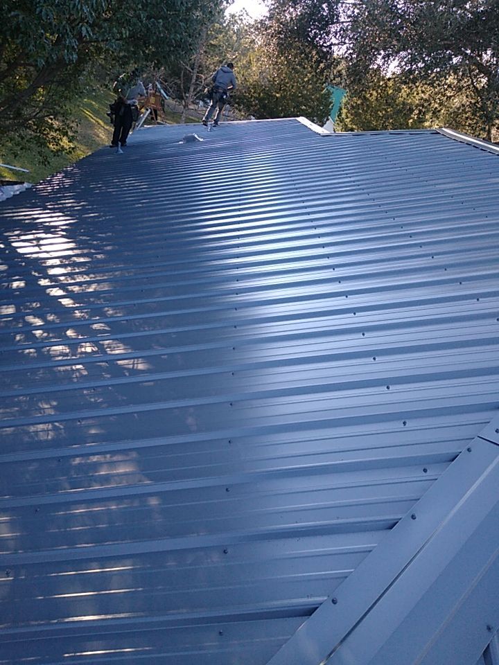 Residential Roofing Installation using Roof Replacement by American Roofing & Construction LLC