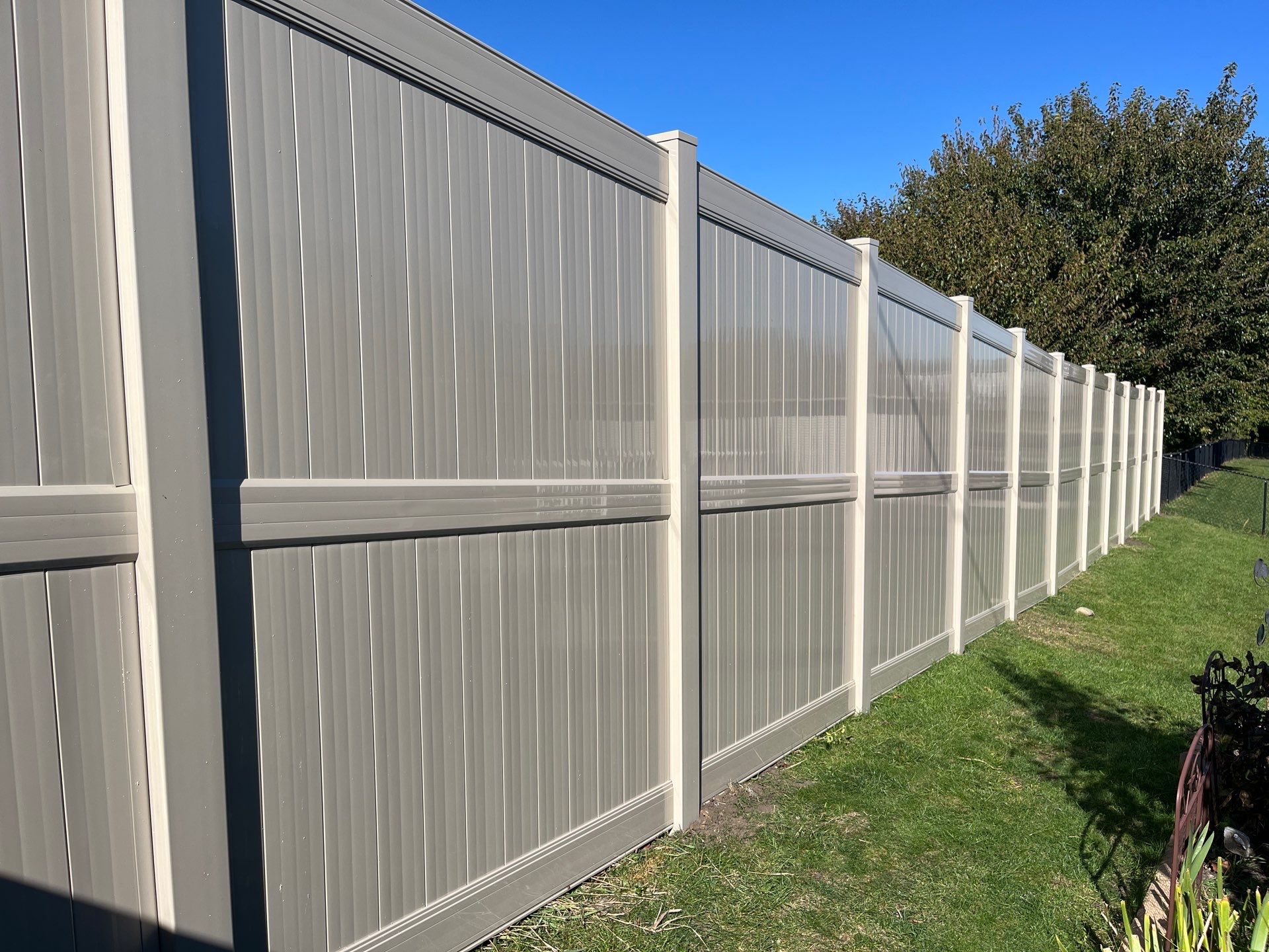 Adobe Vinyl Privacy Fence and Gate Installation in Cedar Falls by Perfect Picket Fence and Stain