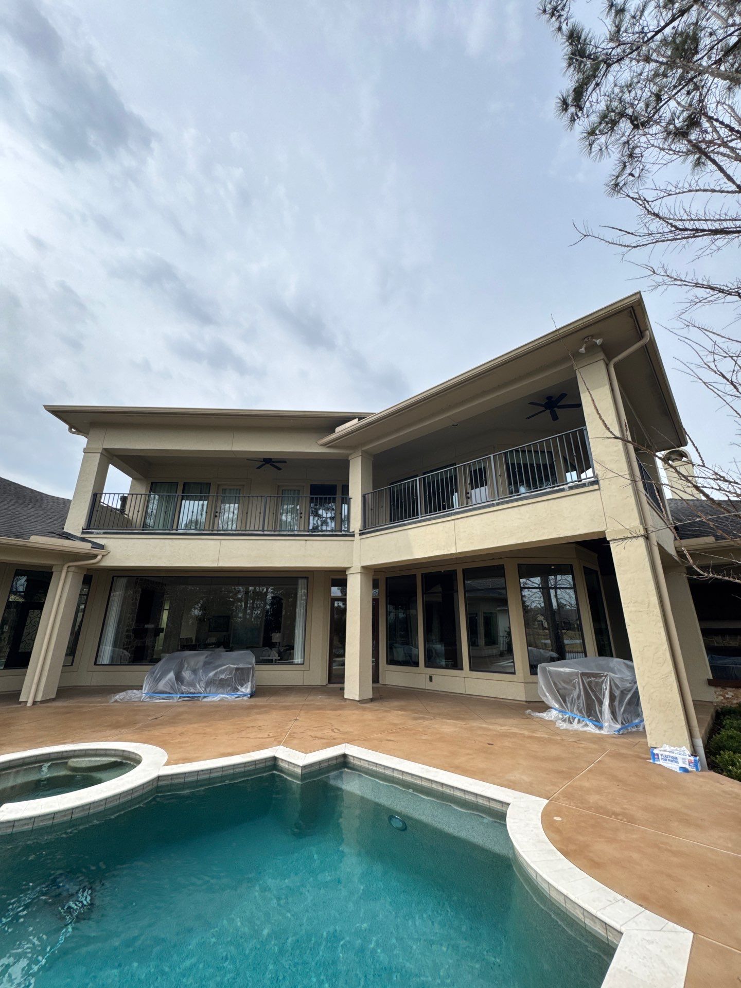 Complete Exterior Painting and Stucco Refinishing in Spring by Rolling Nations