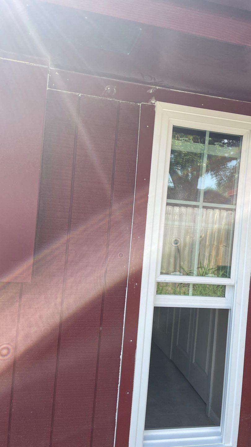 Black and white and red all over by Bayfront Roofing and Construction