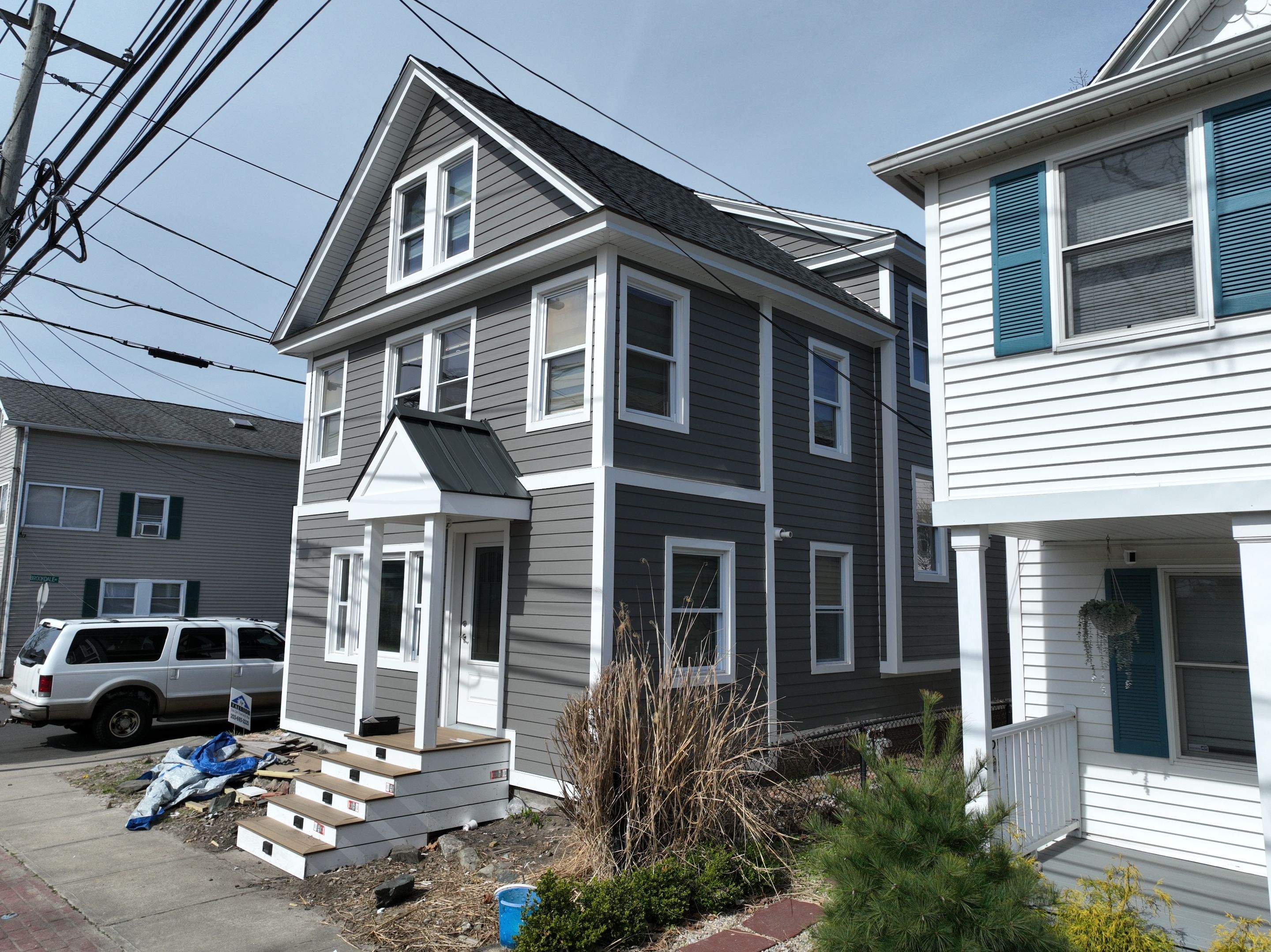 Siding Installation using Hardie Plank Aged Pewter by A Plus Exterior