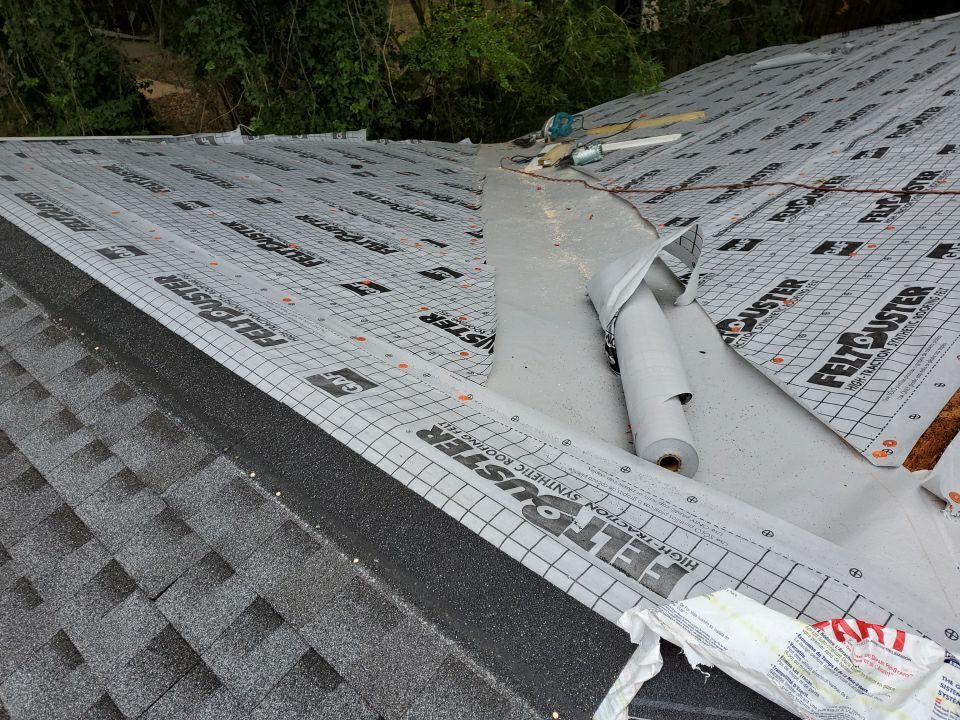 Residential Roofing Installation using Roof Replacement by American Roofing & Construction LLC