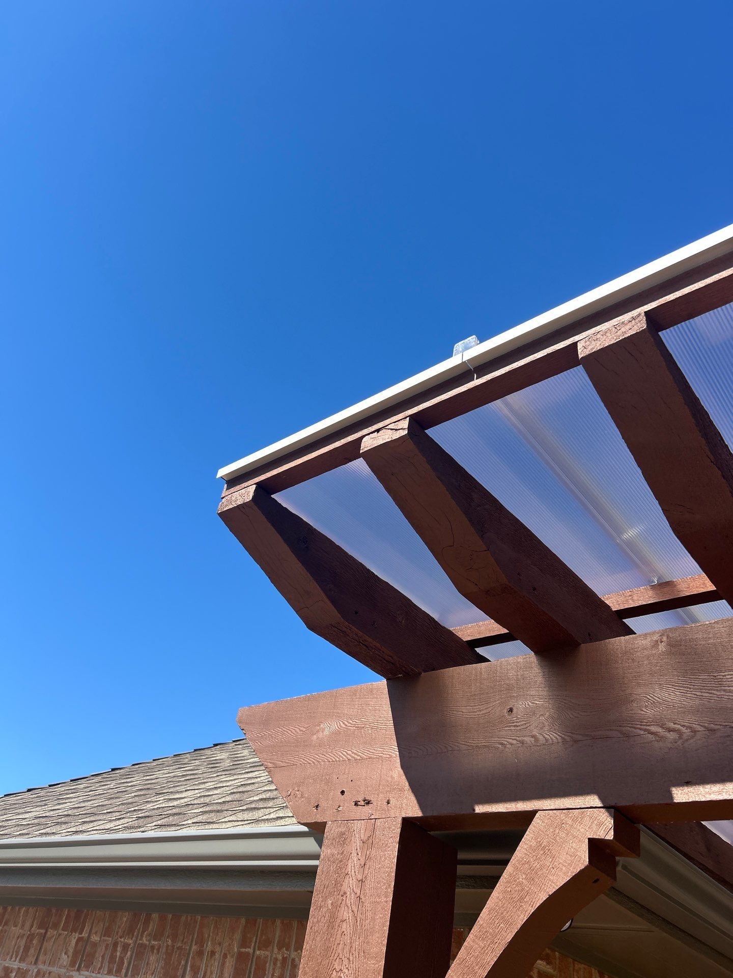 Siding Replacement and Exterior Painting and Pergola Cover Install in Edmond, OK by McCann's Roofing and Construction