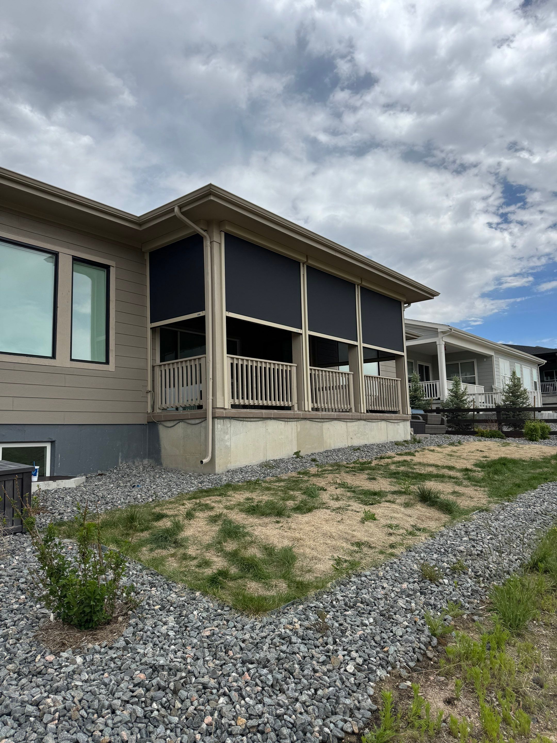 Exterior MagnaTrack Solar Screen Installation on Castle Rock Covered Patio by Outdoor Solutions Colorado