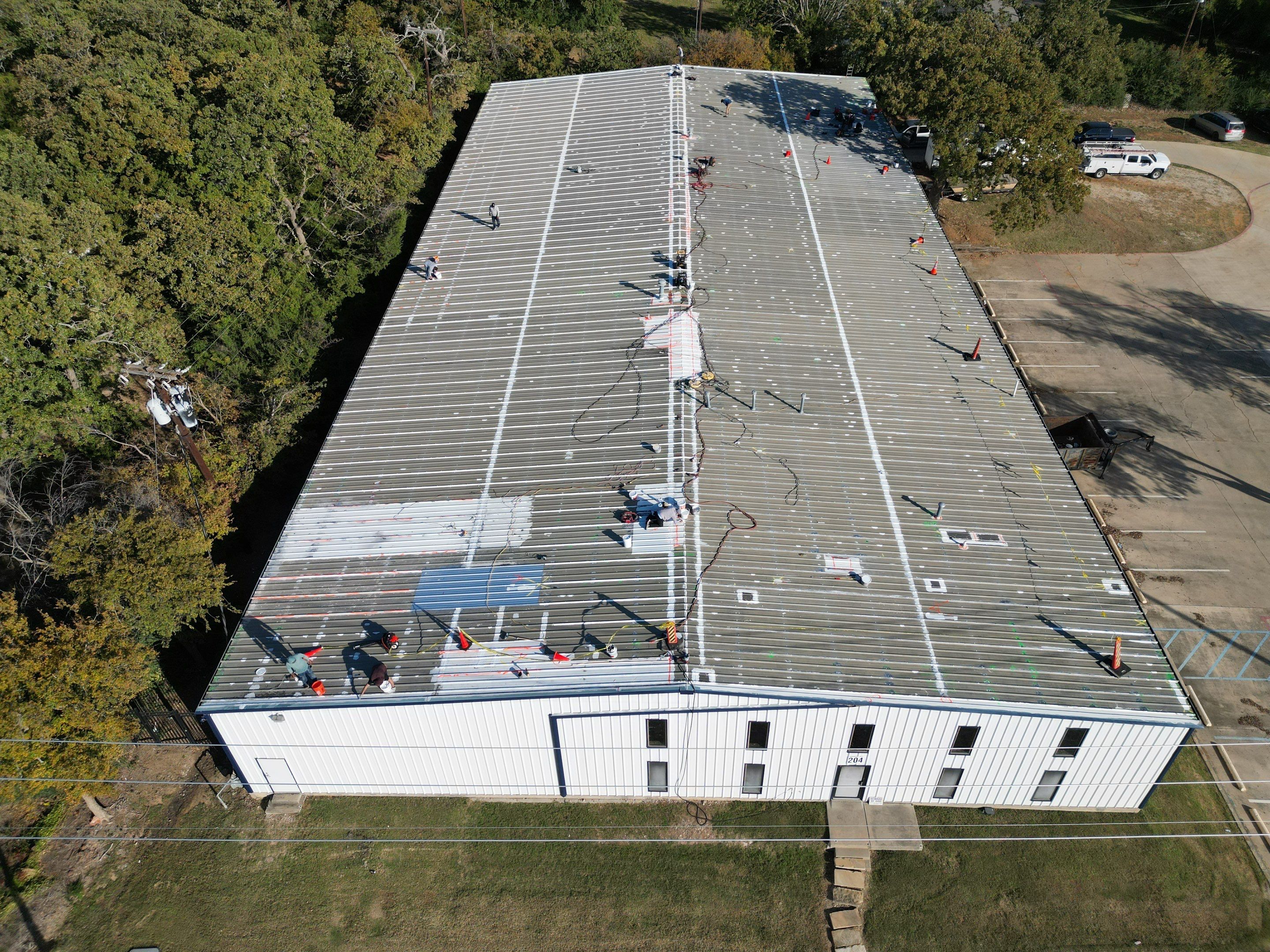 Silicone Coating Metal Rehab by First Out Roofing 