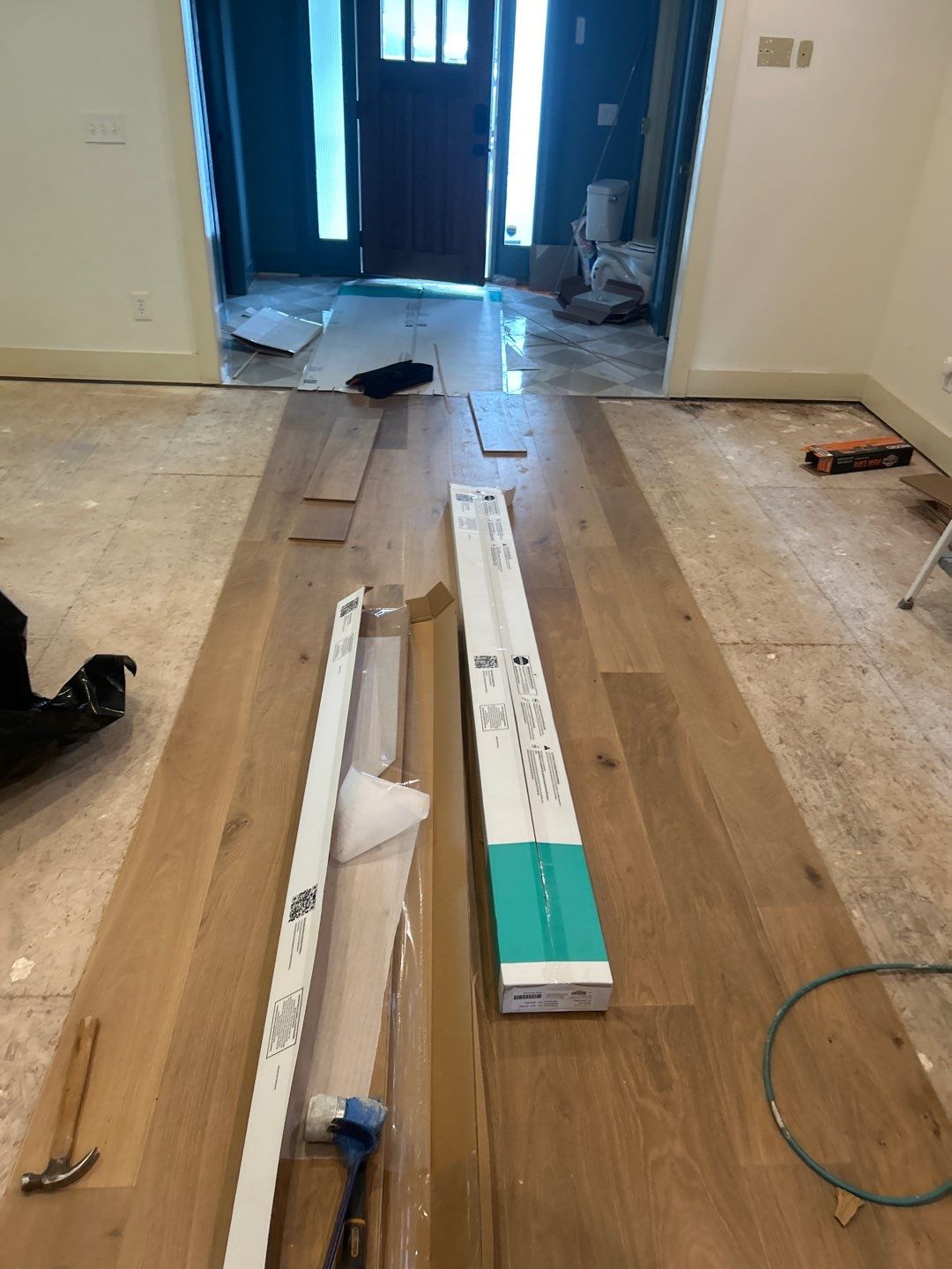 White Oak Hardwood and Checkerboard Tile Installation by Footprints Floors of Nashville