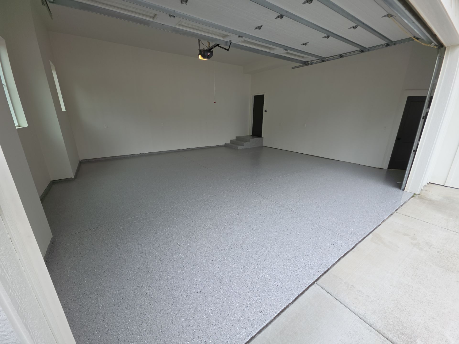 Garage Transformation using Battleship Hybrid by Croc Coatings, LLC