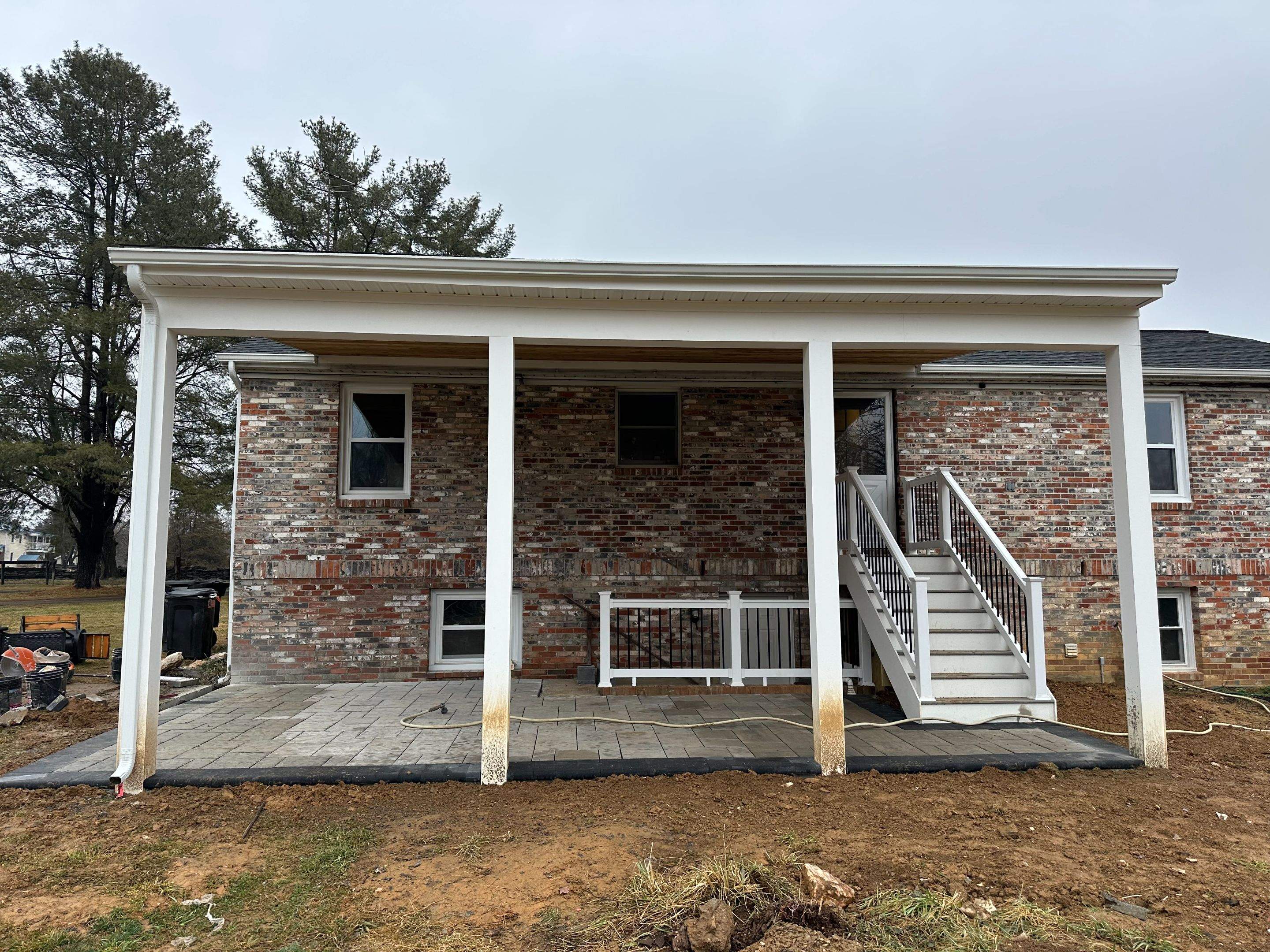 Covered Landing & Paver Patio in Lovettsville, VA by Sunburst Construction Inc