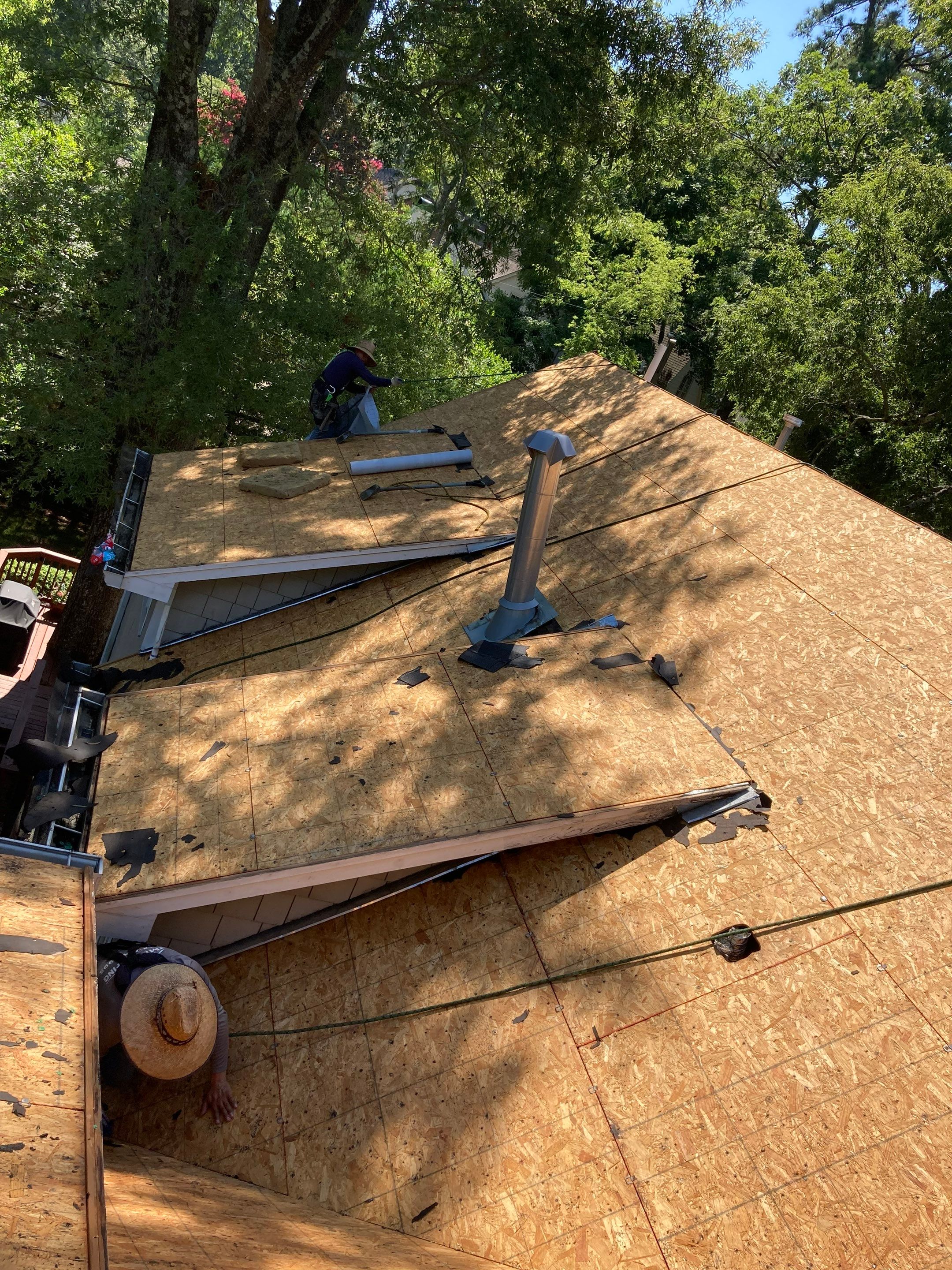 Residential Roofing Installation using Architectural Shingles by The Roofing Dudes