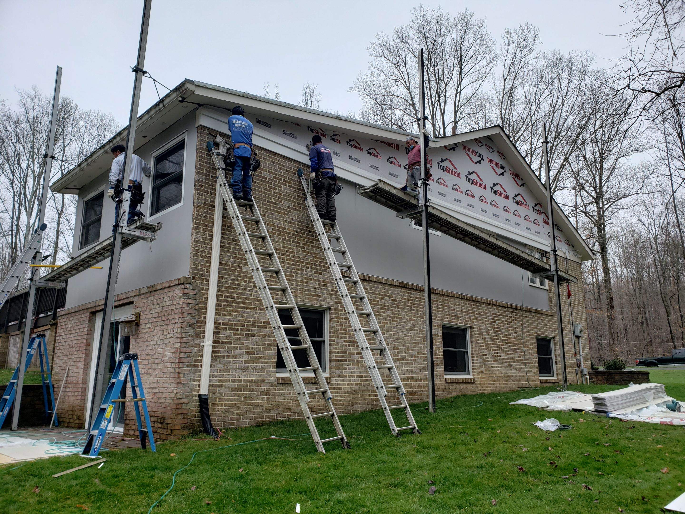 Roof, Siding, Door, and gutter replacement by American Home Contractors