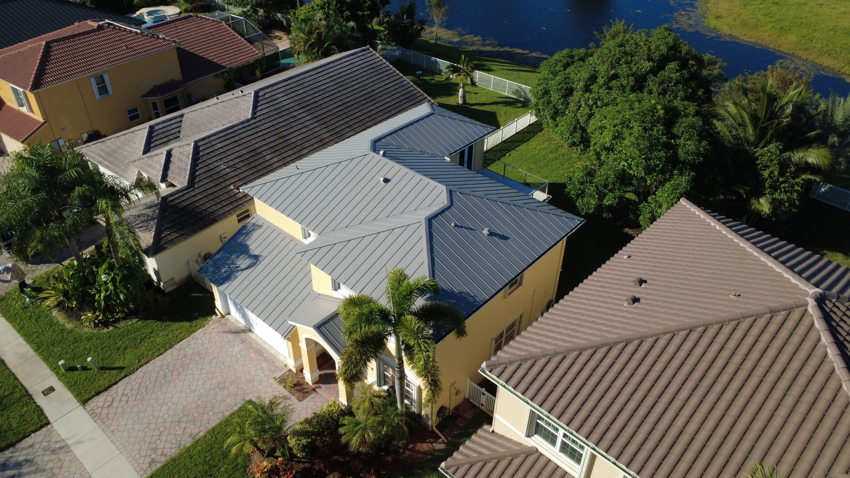 Residential Roofing Installation using 1" Nail strip metal roof by BLUES BROTHERS ROOFING