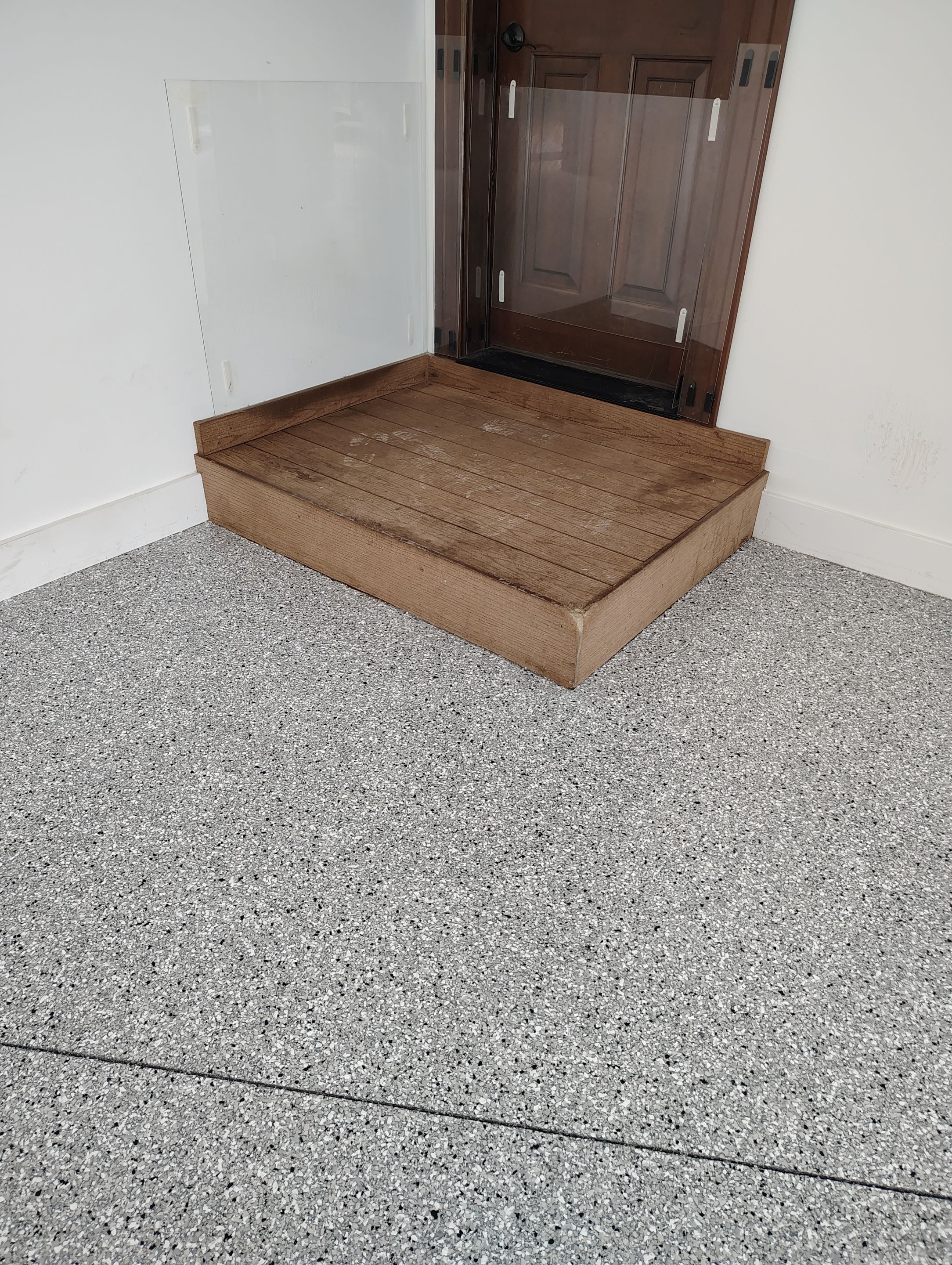 Feather Grey Floor Coating in Sioux Falls, SD by Select Painting, Coatings & Garage Cabinets