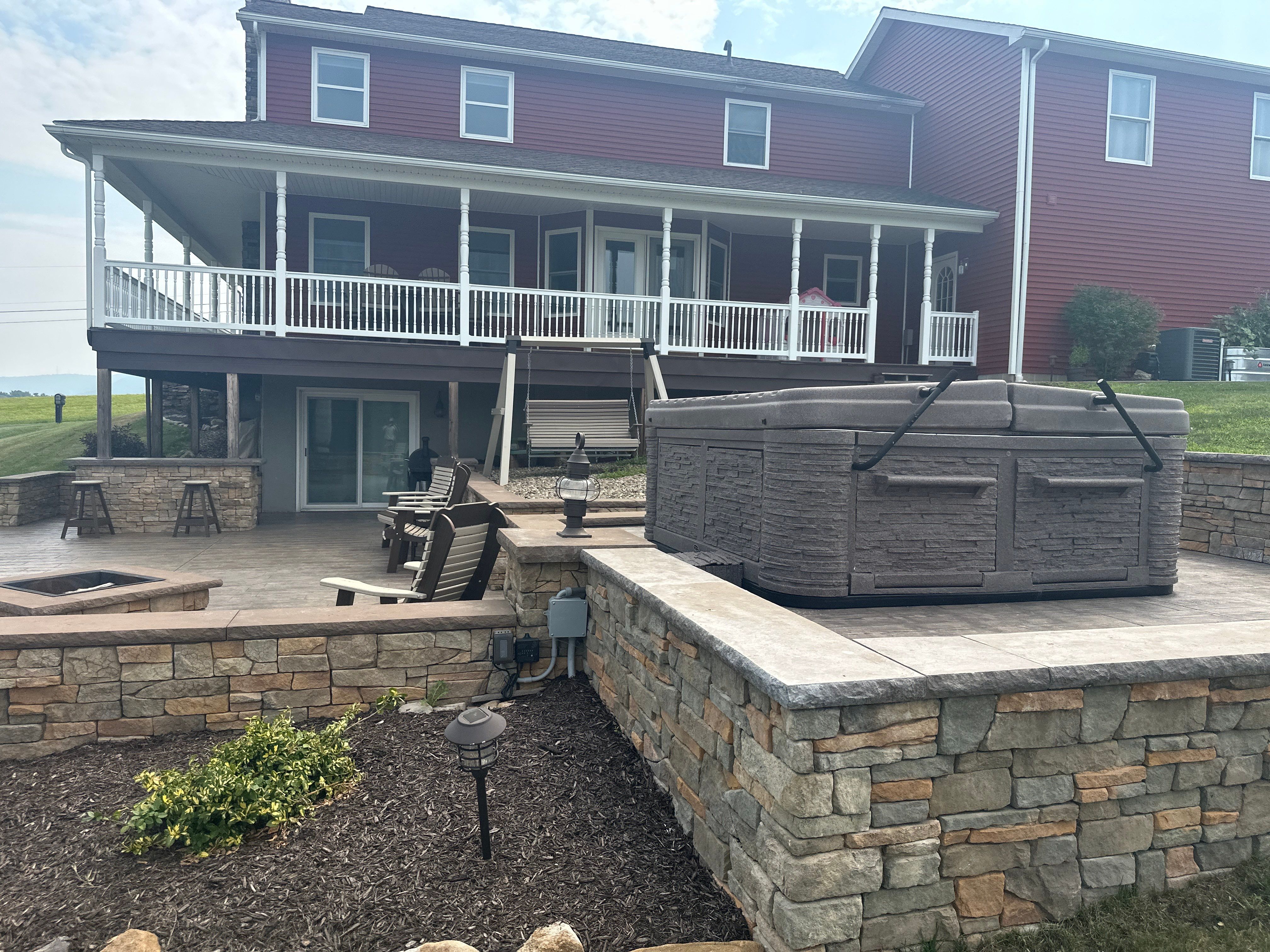 Covered Deck Addition With Custom Gable Roof in Tower City by Esh Builders
