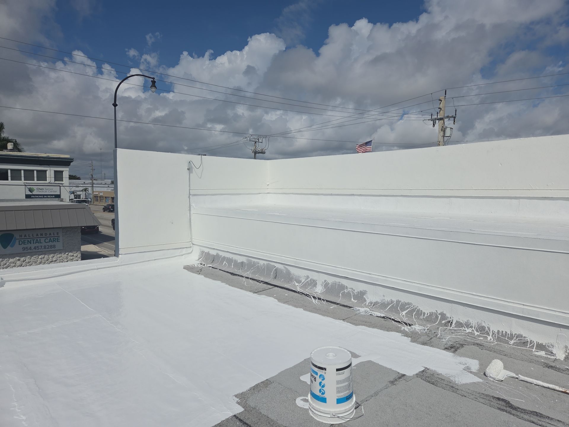Commercial Flat Roof Restoration Using Silicone Coating in Hallandale Beach by Aastro Roofing