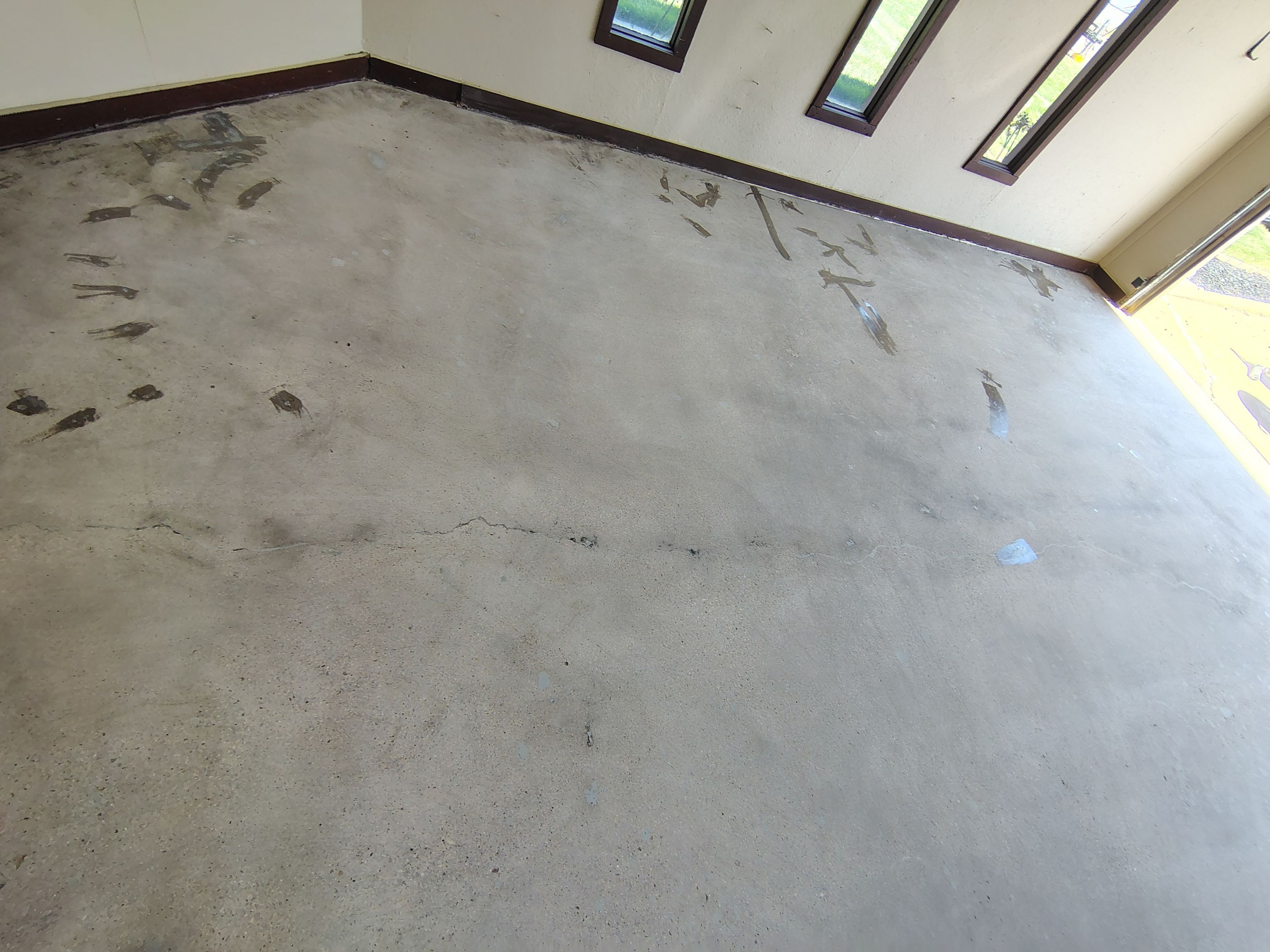 Garage Floor Coating with Crack Repair in Yankton by Select Painting, Coatings & Garage Cabinets