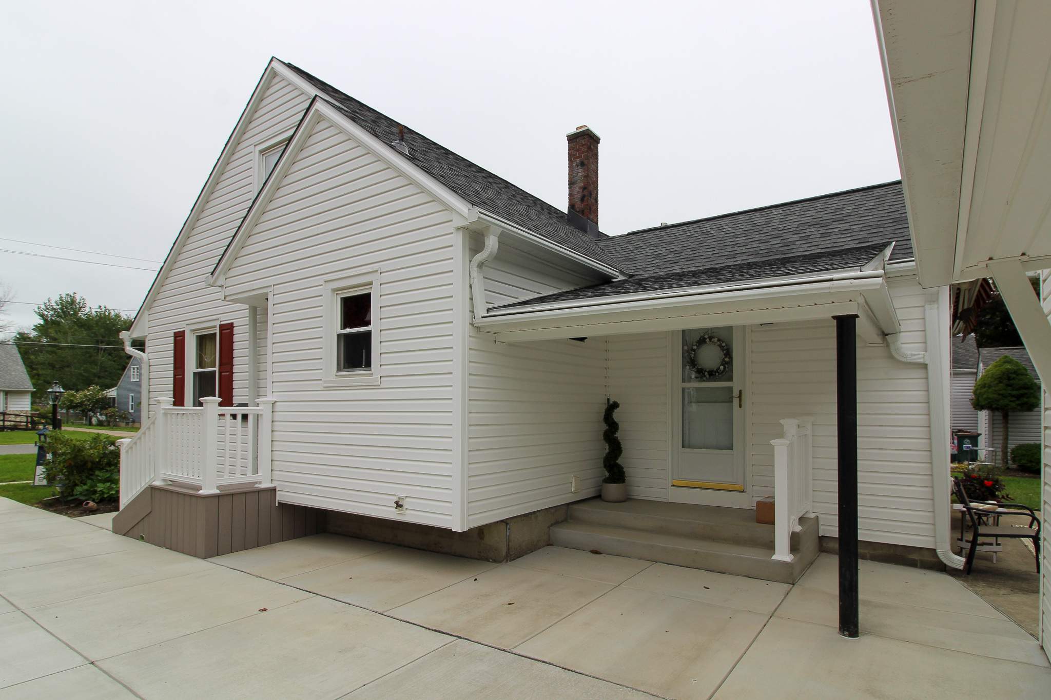 Exterior Renovations- Roofing, Siding, Concrete, and Railings  by Ivy Lea Construction