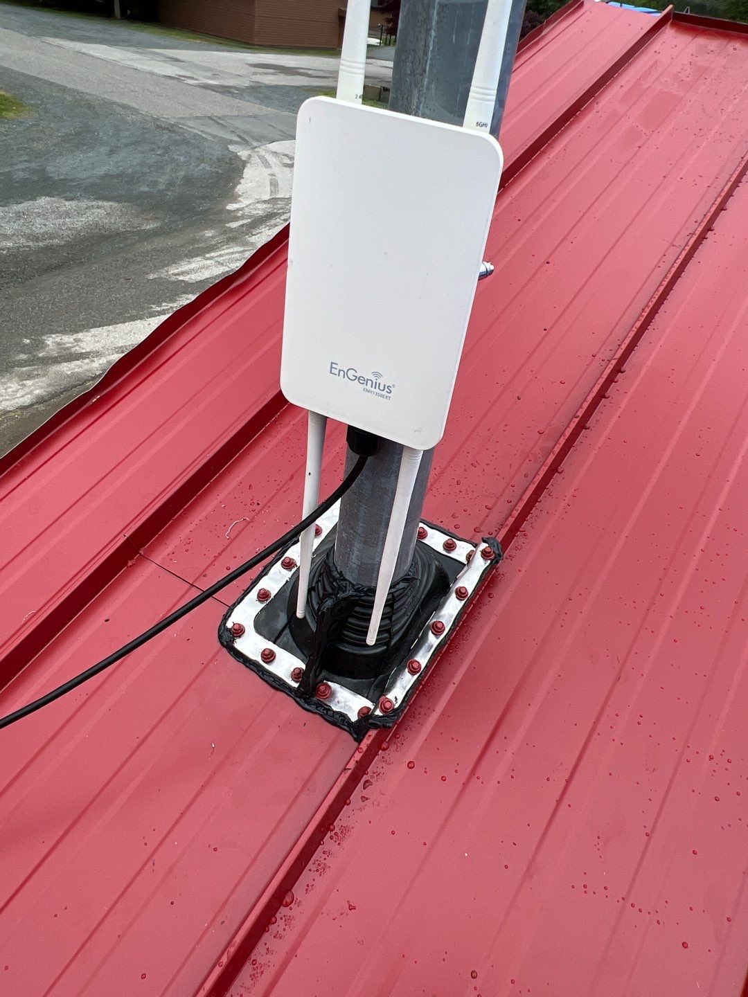 Commercial Roofing Installation using 12" Prolok metal  by Top Notch Roofing Inc