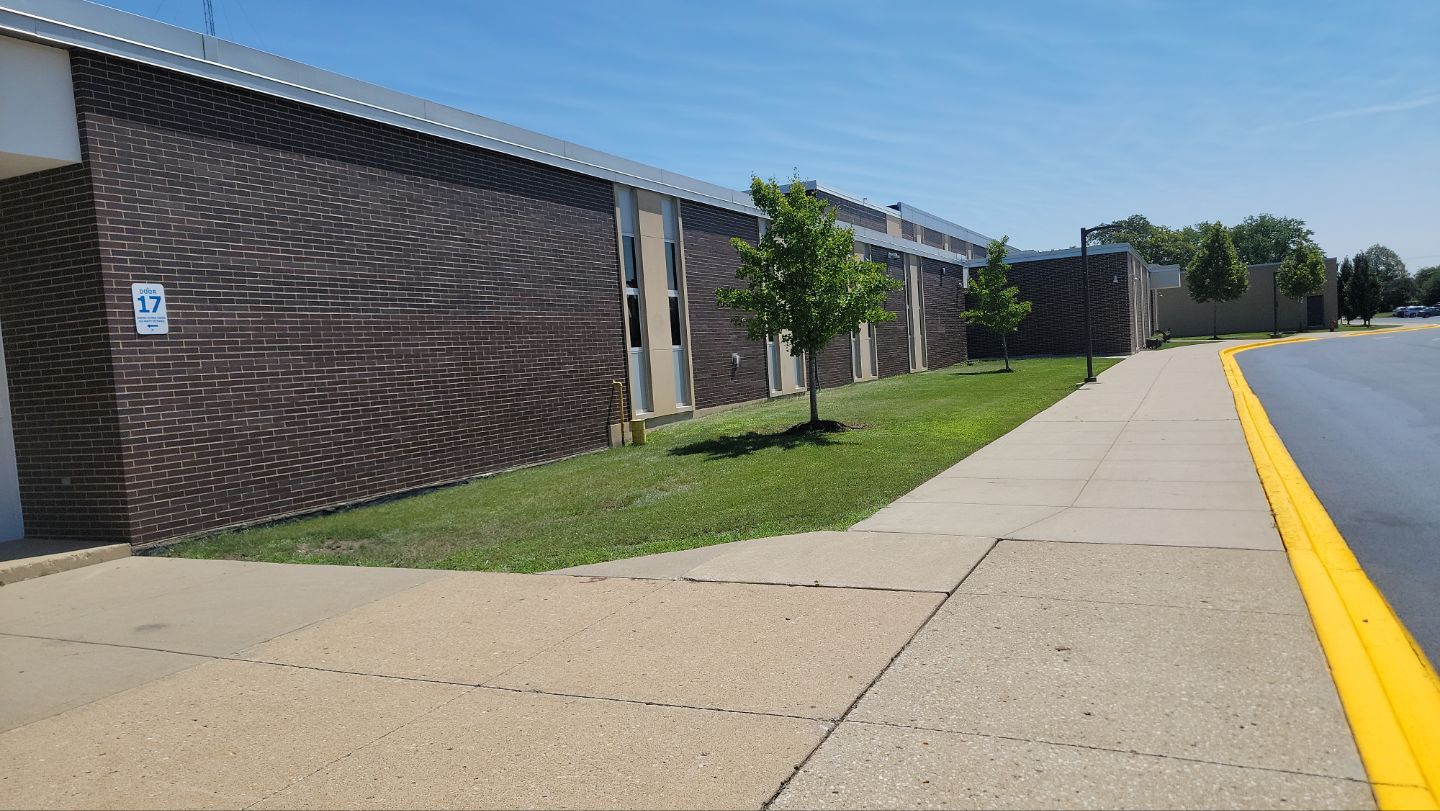 commercial pressure washing using Algaecide, soft wash soap by Northern Power Washing LLC.