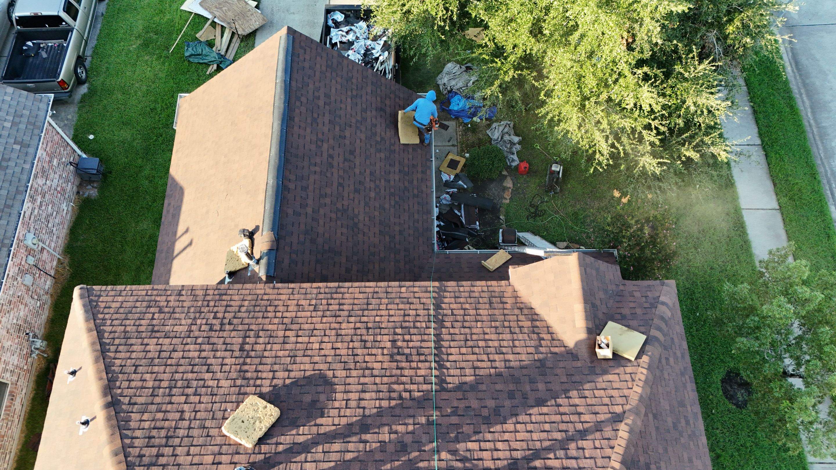 Full Roof Replacement in Warm Brown Tones — Spring, TX by PL Roofing & SB Roofing, LLC.