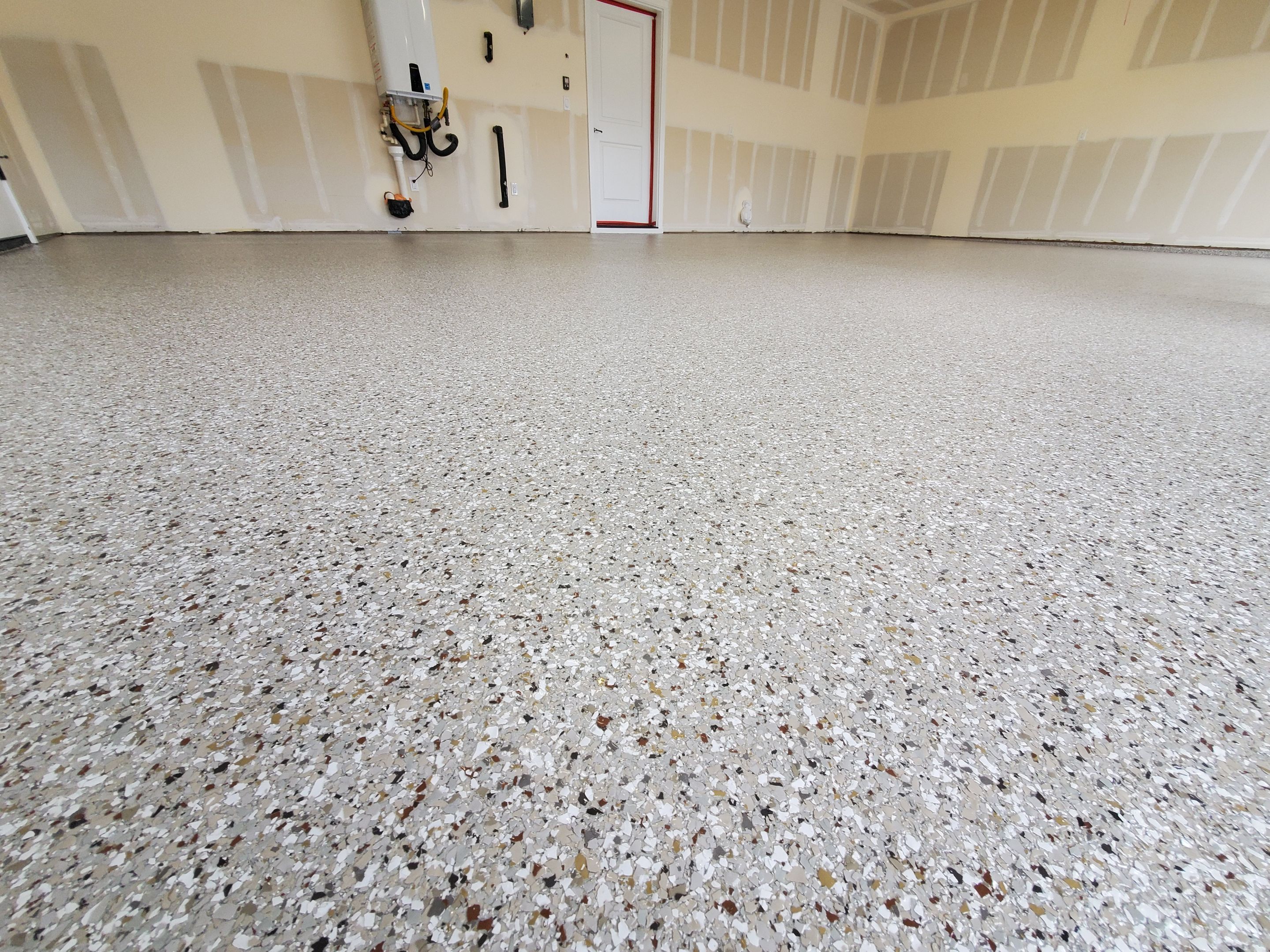 Garage Transformation using Pebble Beach by Croc Coatings, LLC