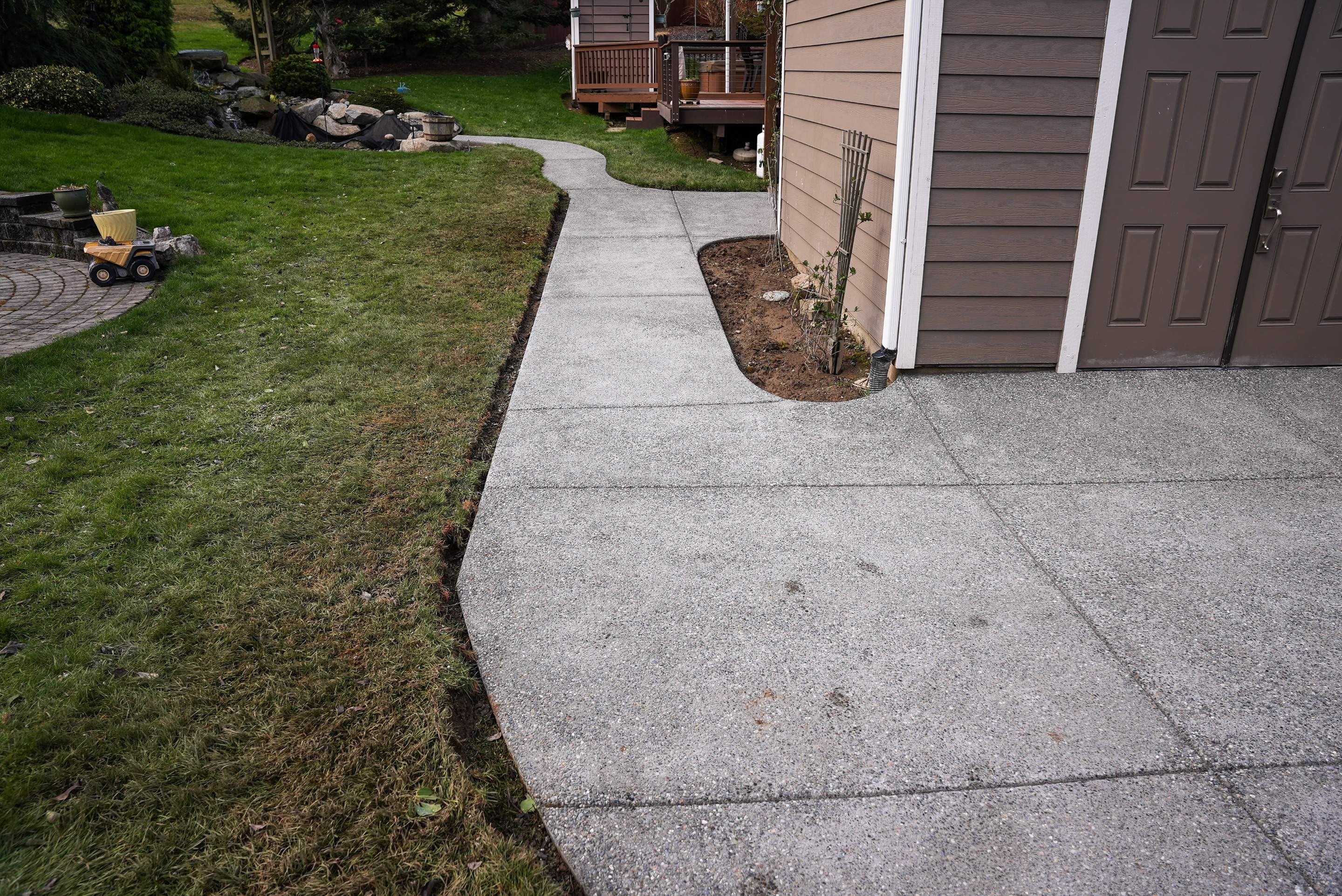 Wayne | Concrete patio & Walkway by Jireh Asphalt & Concrete Inc 