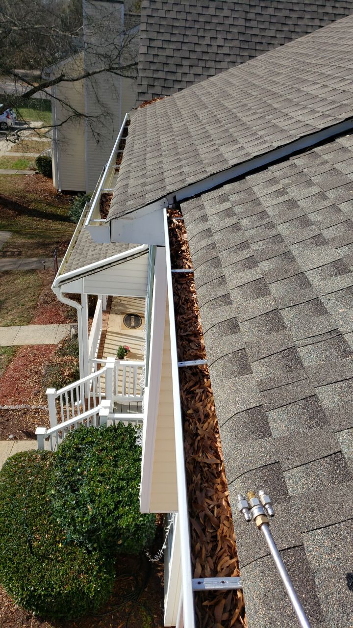 Gutter Cleaning using water by Power Wash Masters LLC