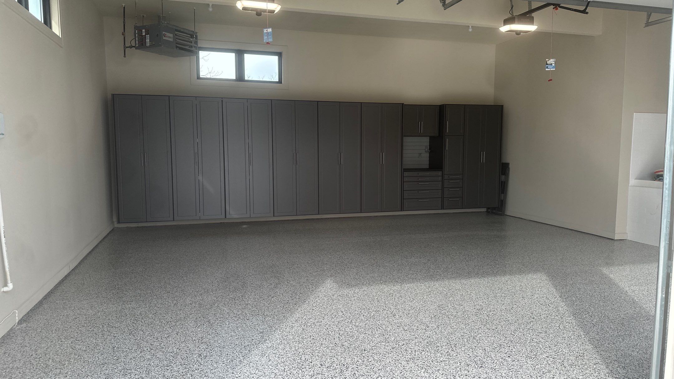 Tim S. added Cabinets and a Banner Garage Floor to his garage by Banner Garage