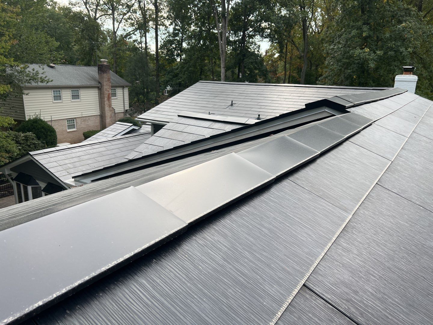 Tesla Solar Roof Replacement using Tesla Solar Roof V3 Tiles by American Home Contractors
