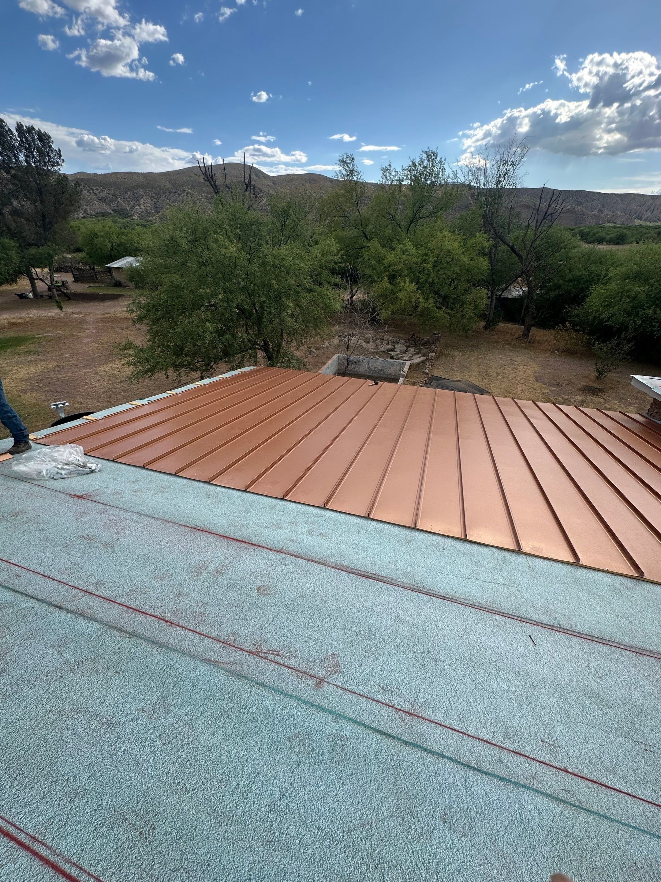 Bronze Standing Seam by Reimagine Roofing