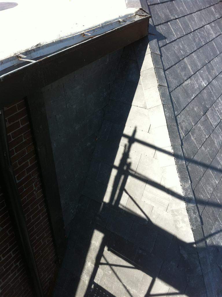 Historic Building ROOF REPLACEMNT with GAF TruSlate  on steep slop and Versico 60mil TPO on flat roof by Gorilla Exteriors Contracting, LLC