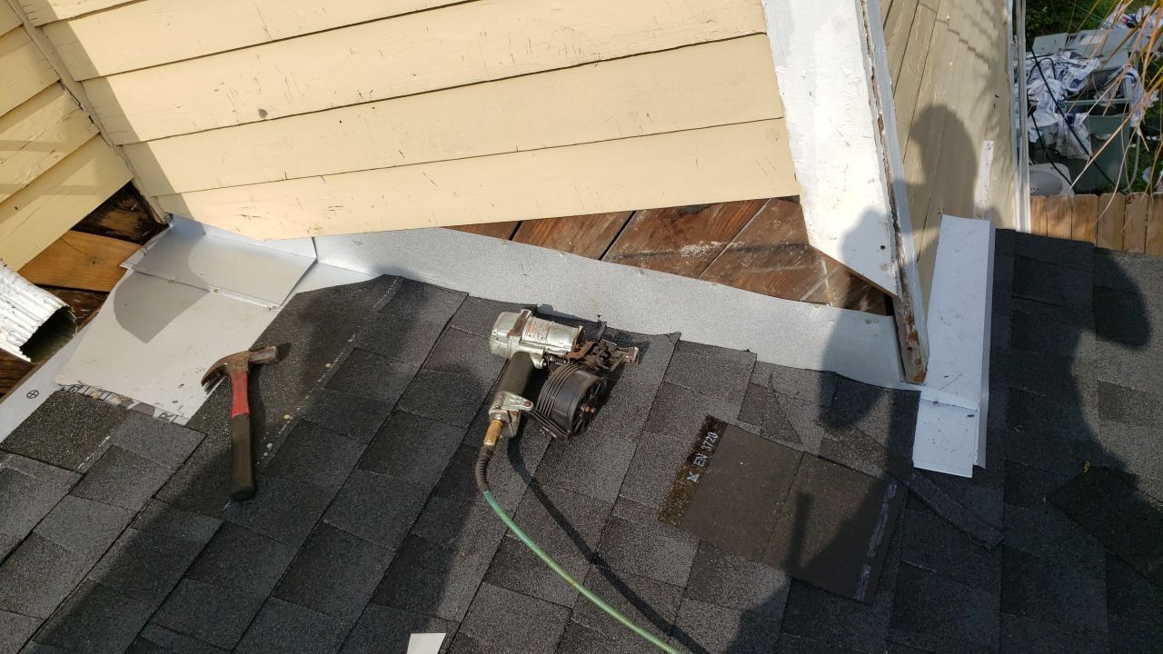 Residential Roofing Installation using Roof Replacement by American Roofing & Construction LLC