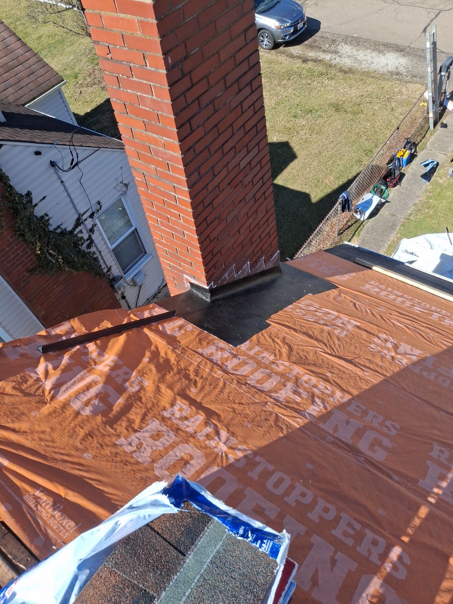Residential Roofing Installation using GAF TImberline HDZ Hickory by Rainstoppers Roofing